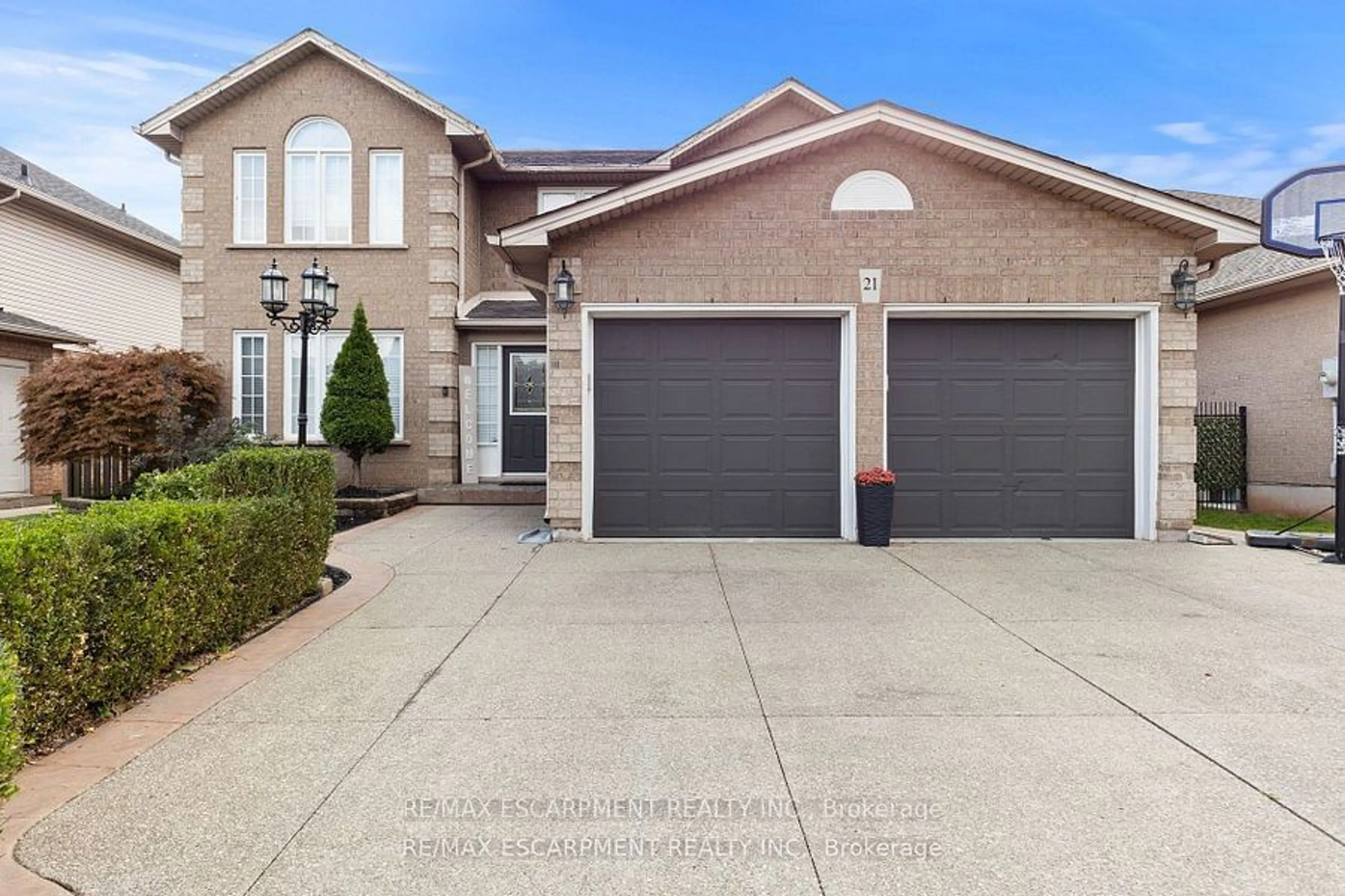 Home with brick exterior material, street for 21 Tuscani Dr, Hamilton Ontario L8E 5W4