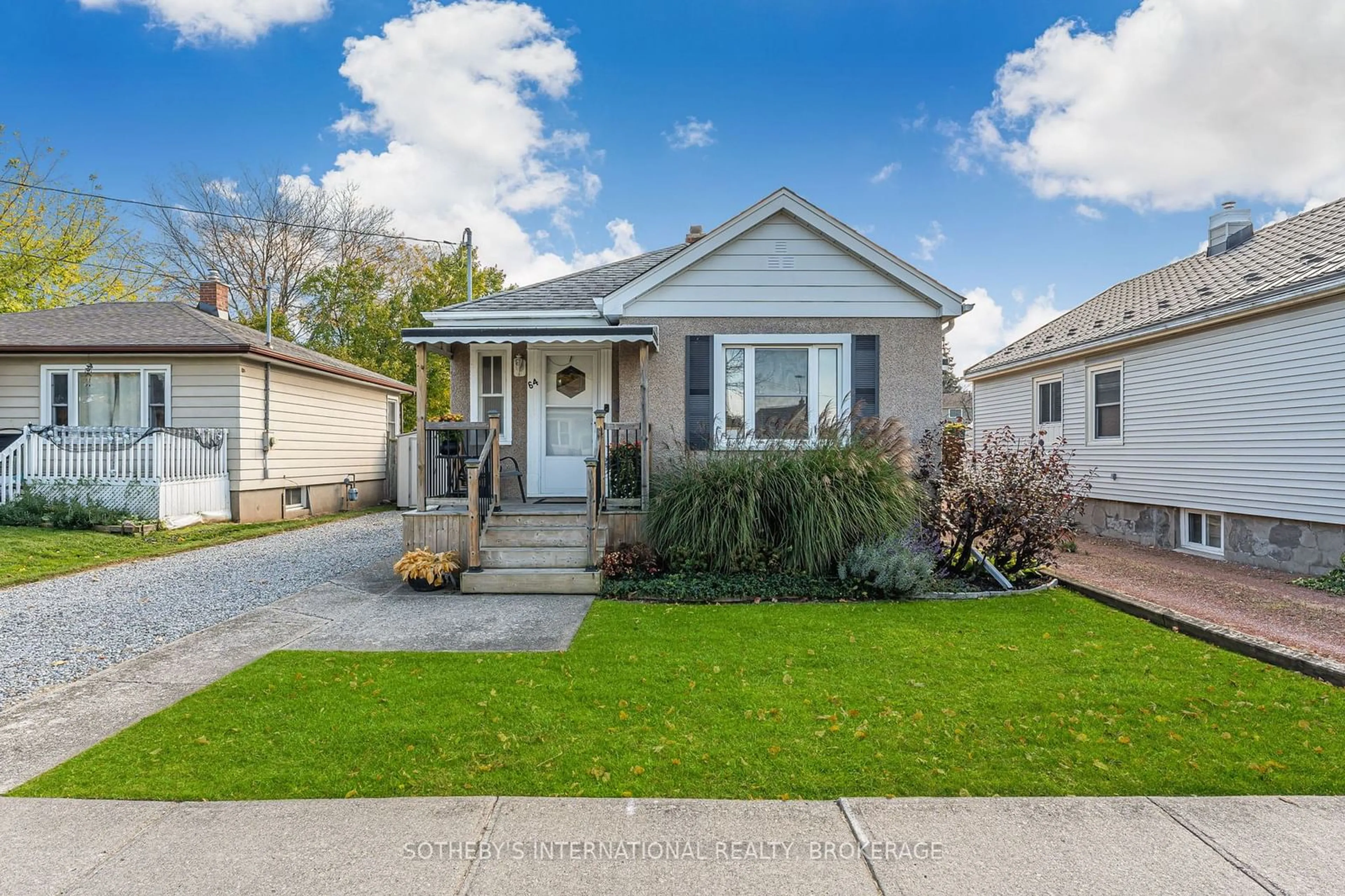 Home with vinyl exterior material, street for 64 Scott St, St. Catharines Ontario L2R 1C9