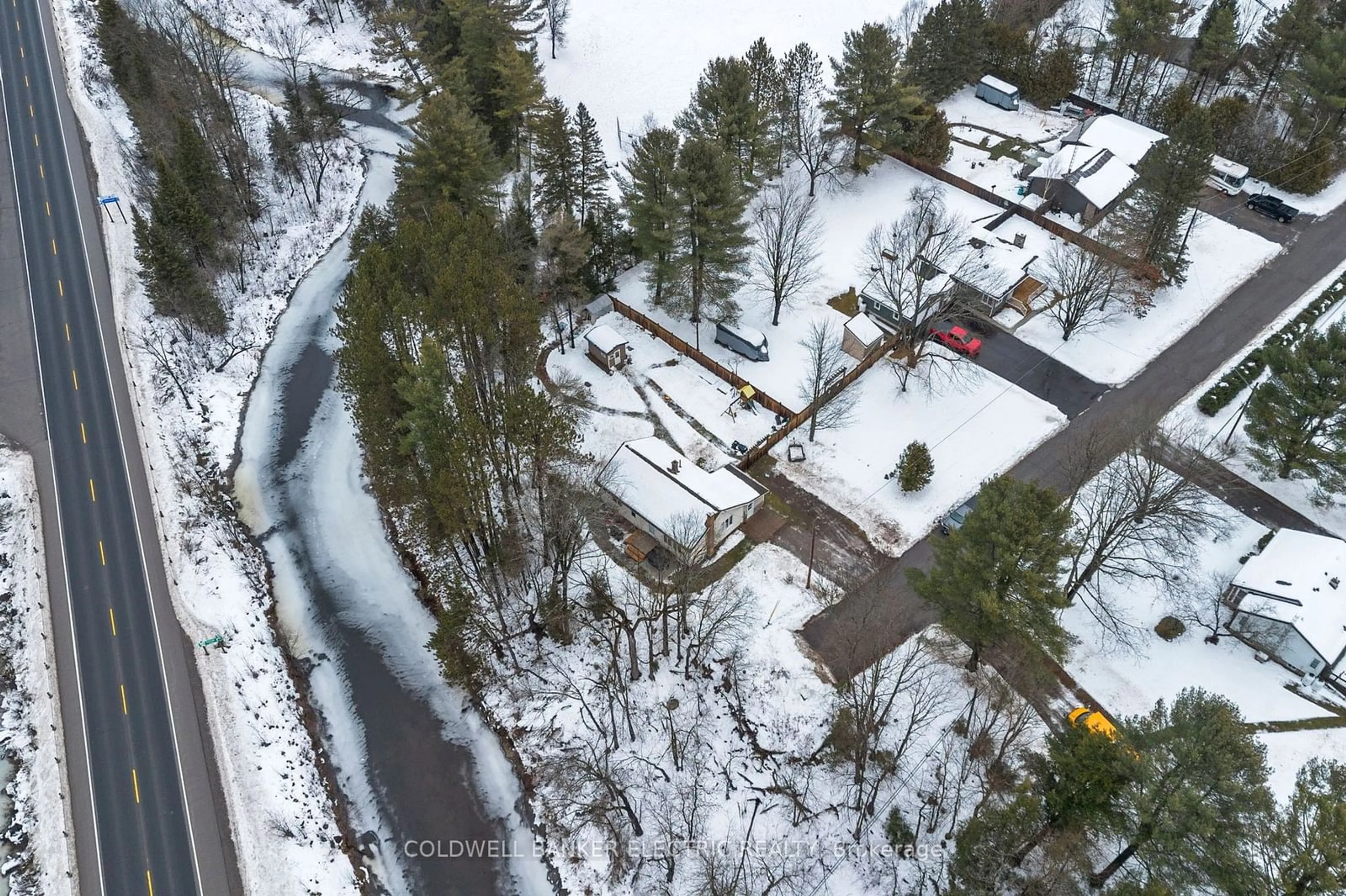 A pic from outside/outdoor area/front of a property/back of a property/a pic from drone, street for 58 River St, North Kawartha Ontario K0L 1A0