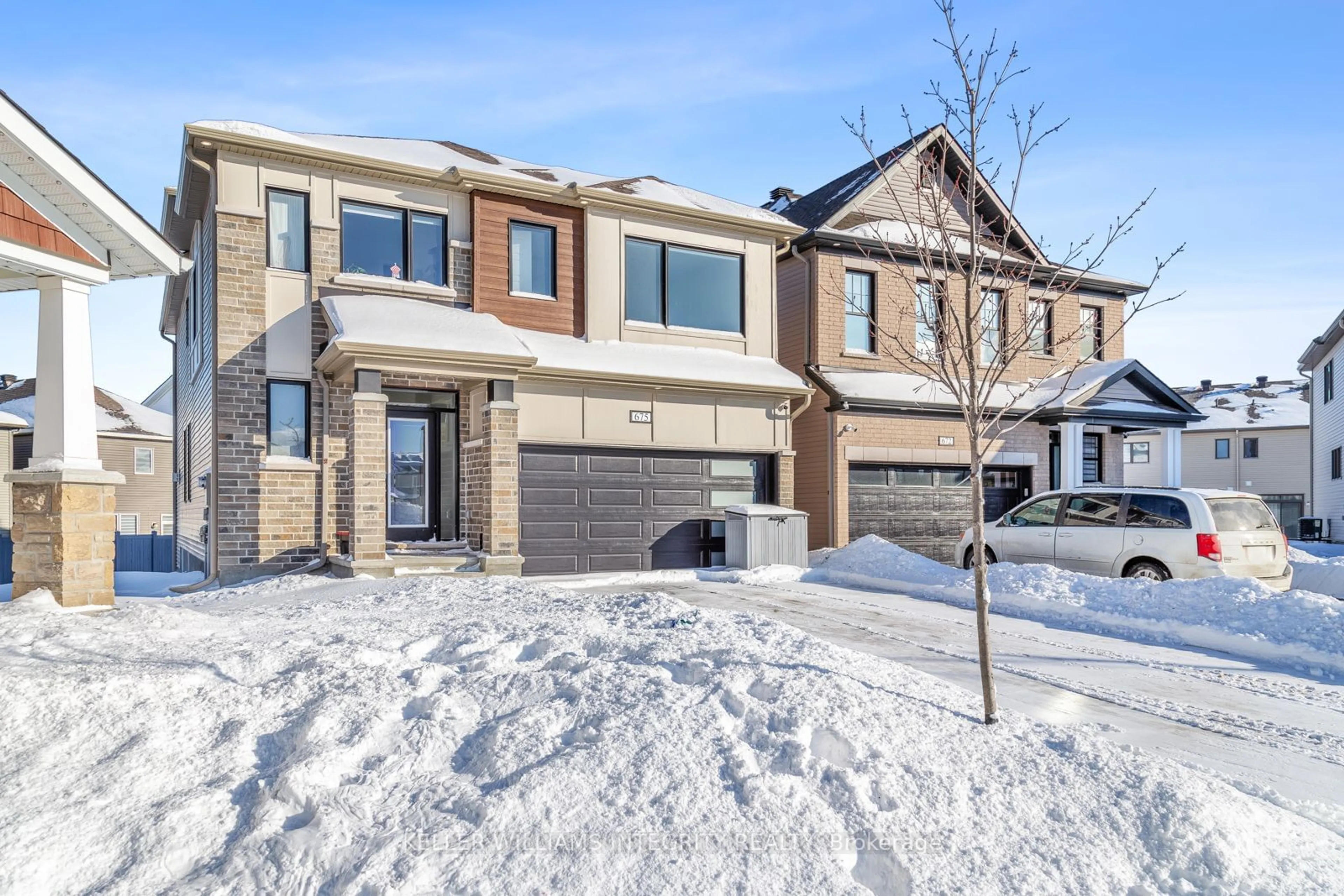 Home with brick exterior material, street for 675 Rye Grass Way, Barrhaven Ontario K2J 6Z8