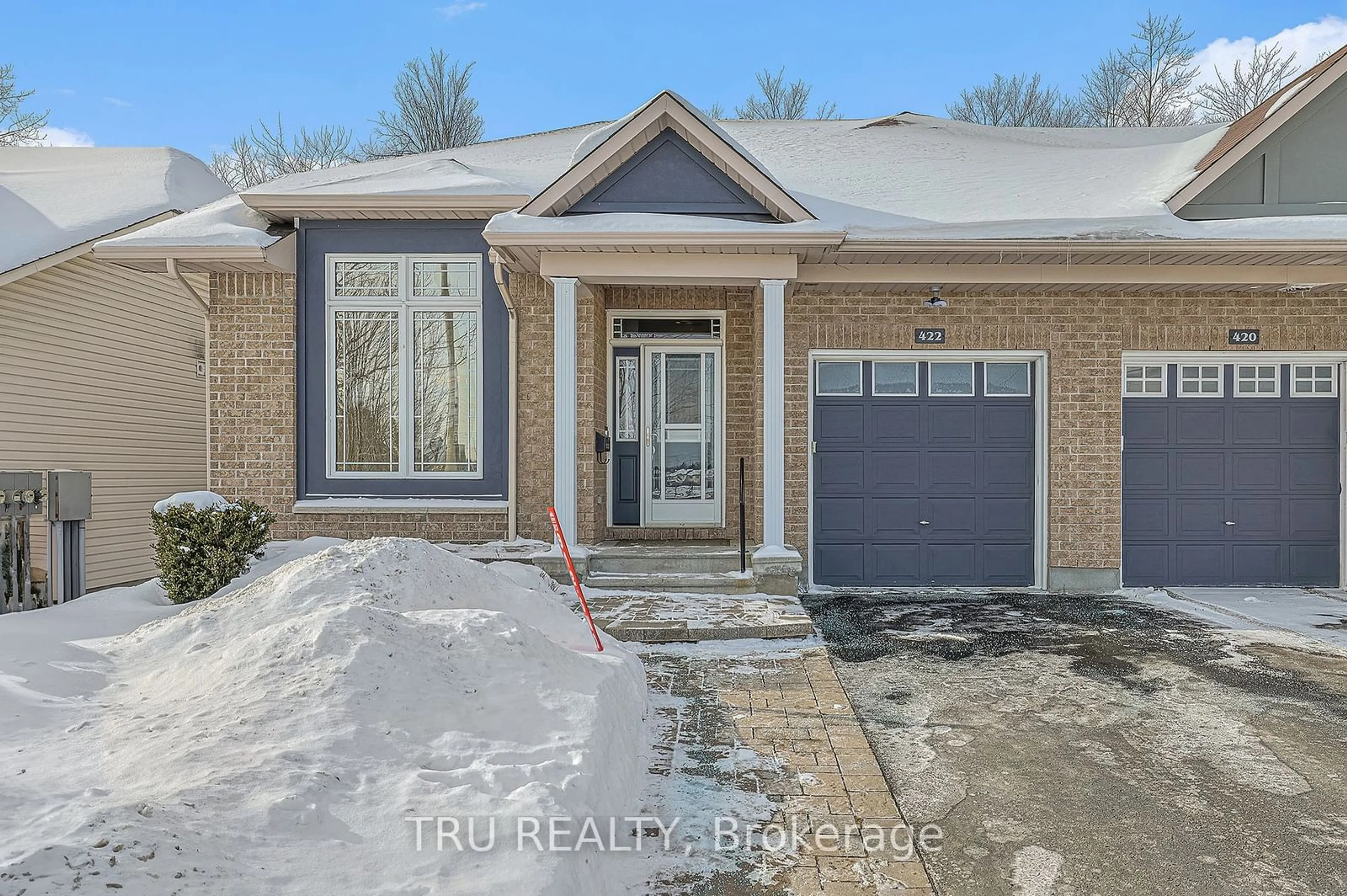 Home with brick exterior material, street for 422 Statewood Dr, Kanata Ontario K2K 0B7