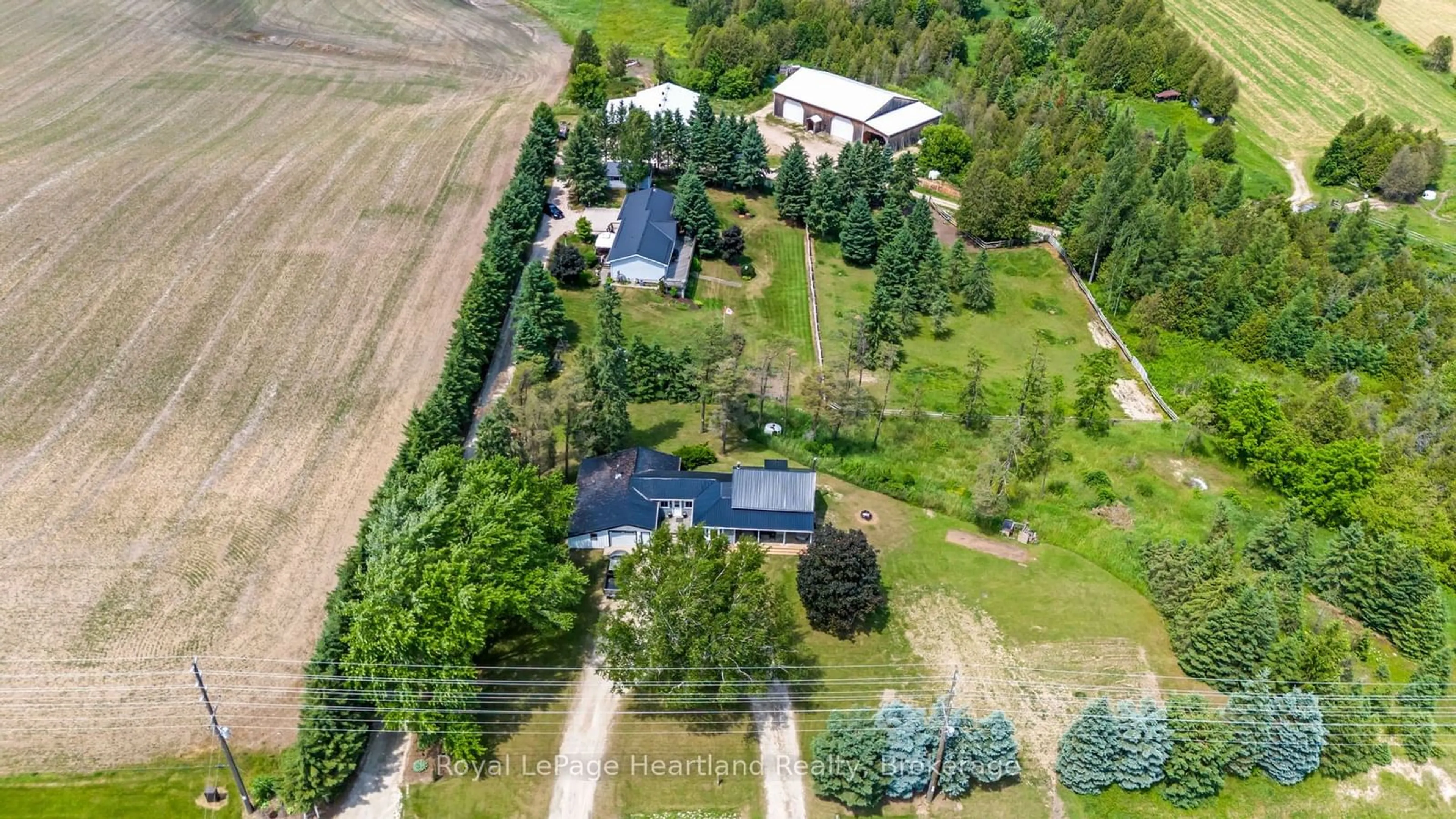 A pic from outside/outdoor area/front of a property/back of a property/a pic from drone, forest/trees view for 341149 Grey Rd 28, West Grey Ontario N4N 3B9