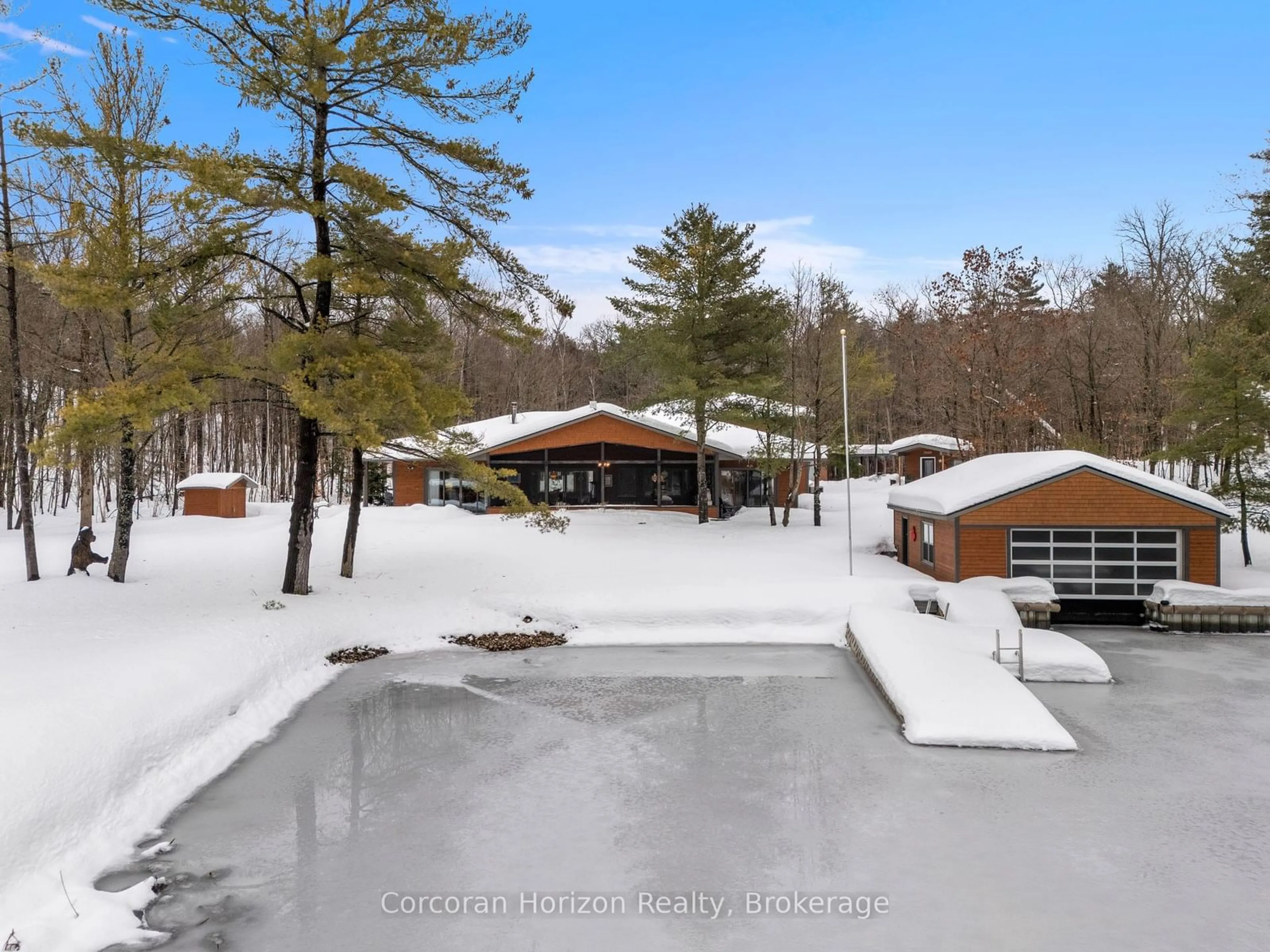 A pic from outside/outdoor area/front of a property/back of a property/a pic from drone, water/lake/river/ocean view for 308 O'HARA POINT Rd, Georgian Bay Ontario L0K 1S0