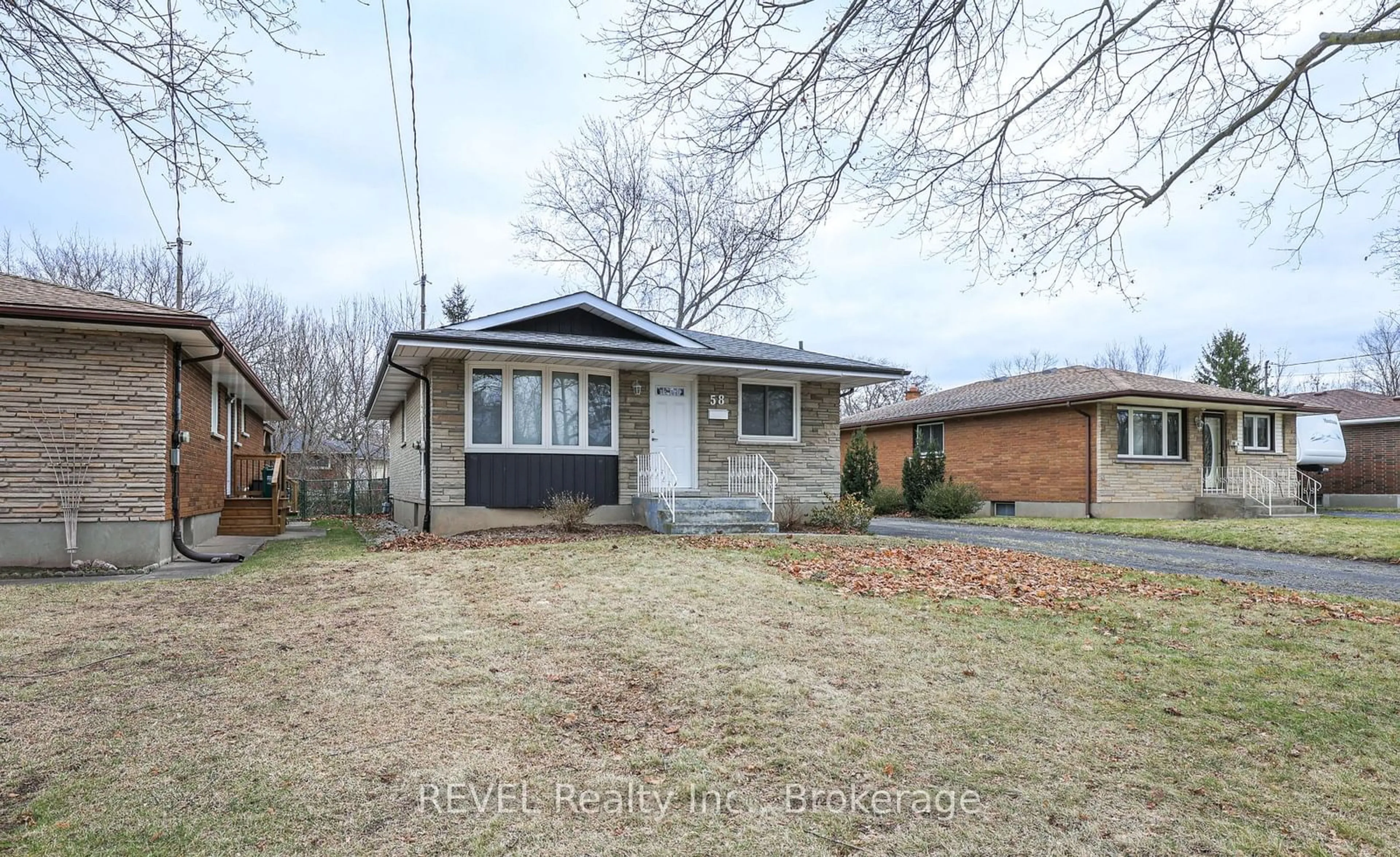 Home with brick exterior material, street for 58 Highcourt Cres, St. Catharines Ontario L2M 3M6