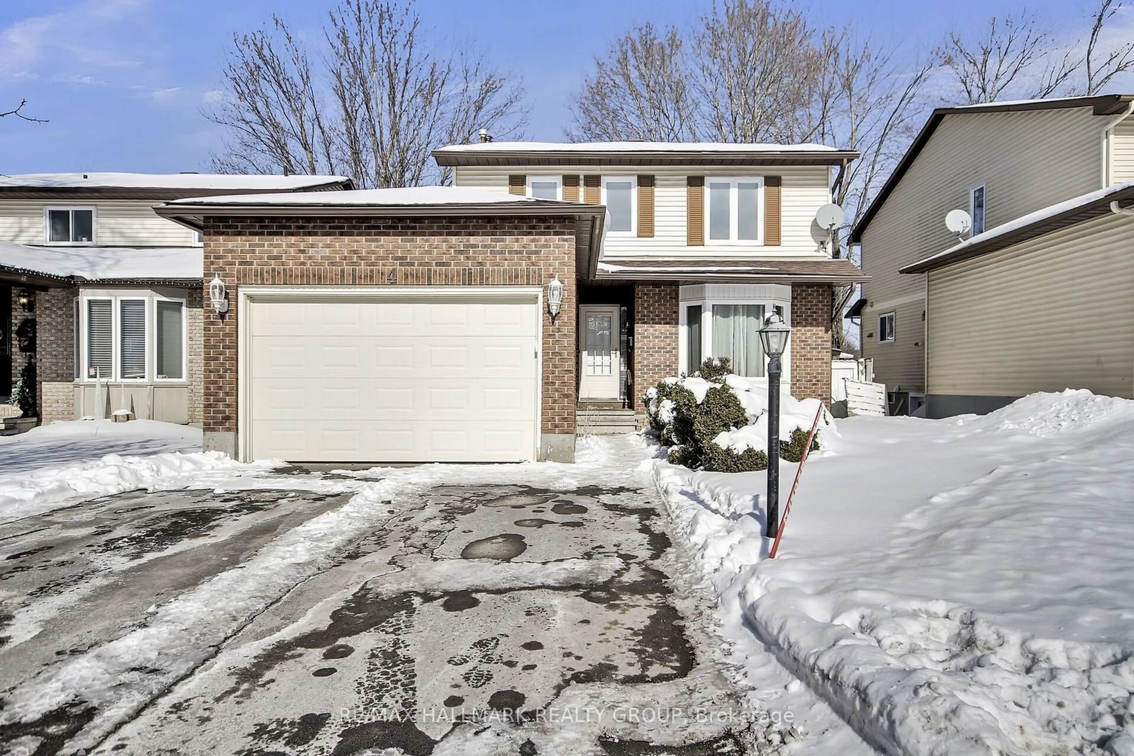 Home with brick exterior material, street for 4 Sewell Way, Kanata Ontario K2L 2W5