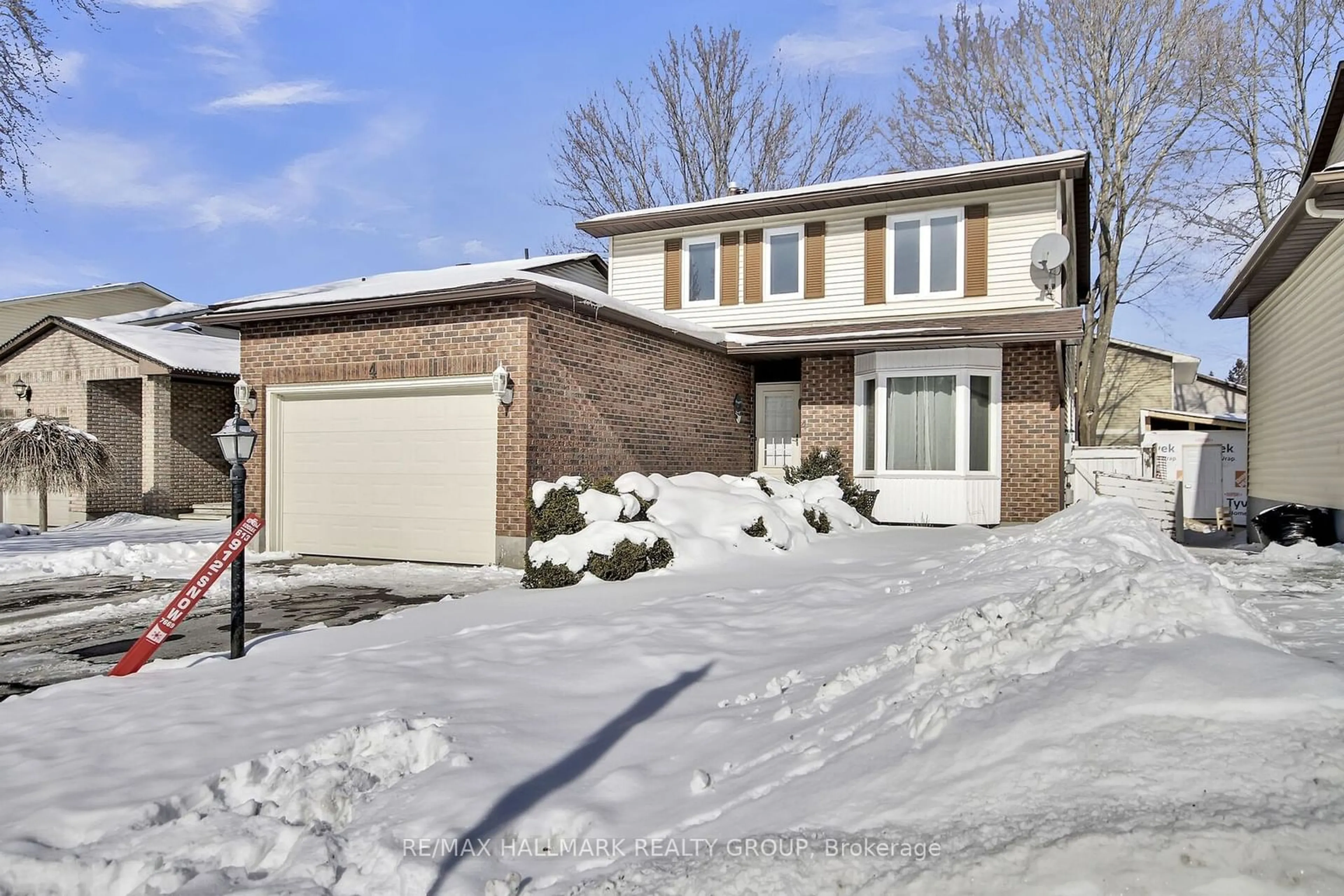 Home with brick exterior material, street for 4 Sewell Way, Kanata Ontario K2L 2W5