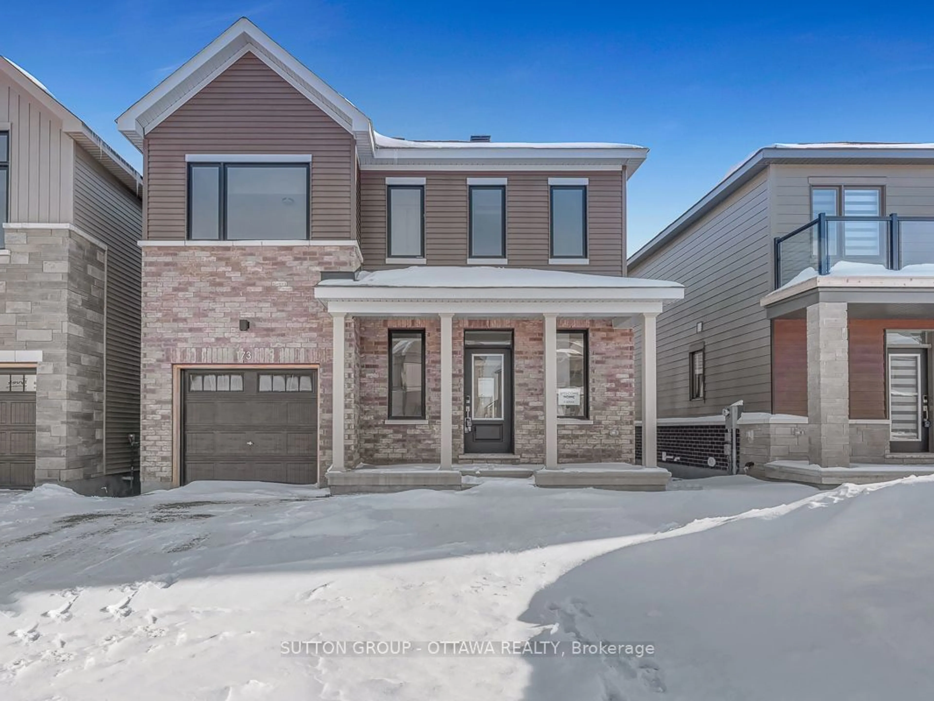 Home with brick exterior material, street for 173 Conservancy Dr, Barrhaven Ontario K2J 7L8