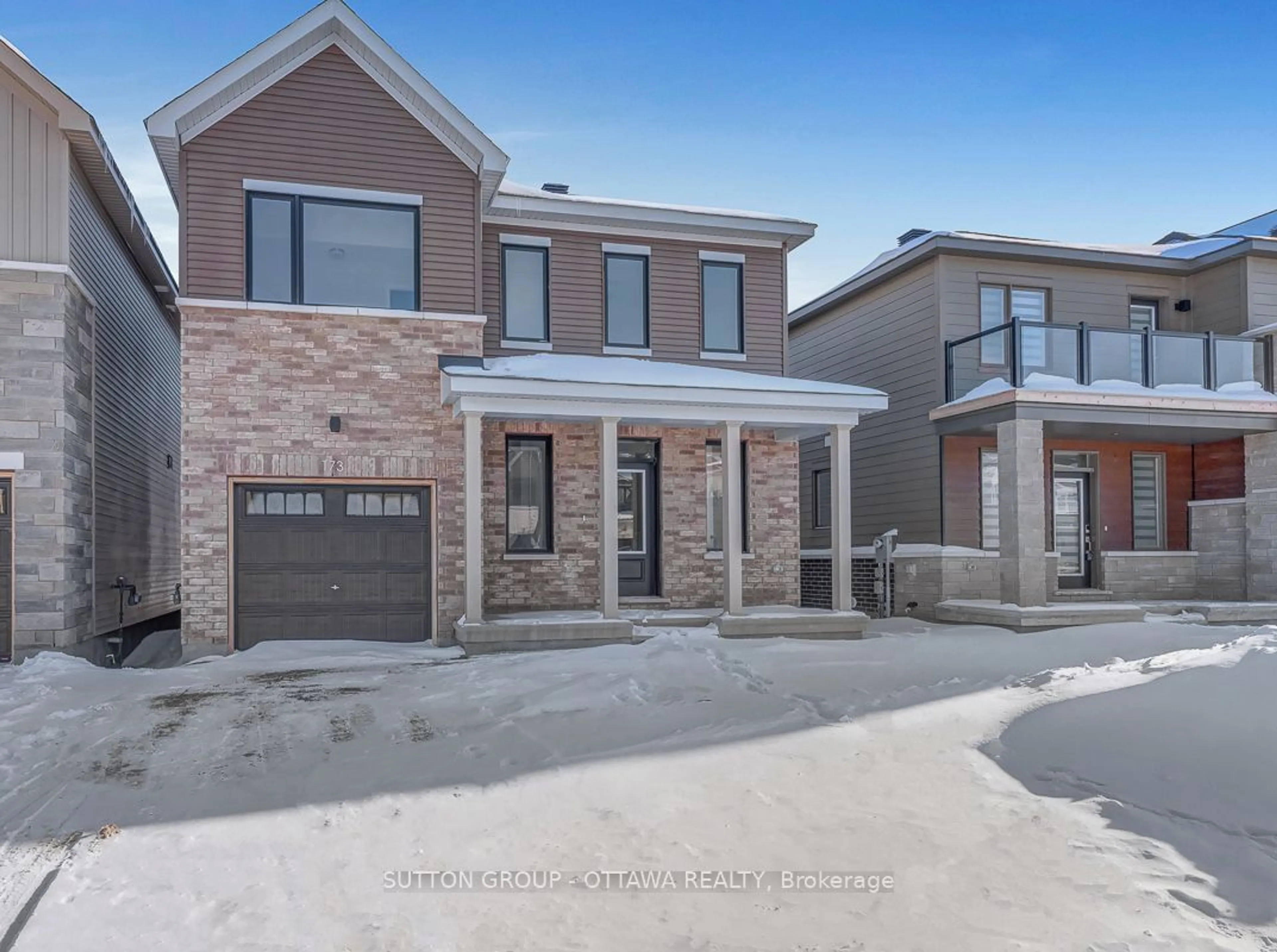 Home with brick exterior material, street for 173 Conservancy Dr, Barrhaven Ontario K2J 7L8