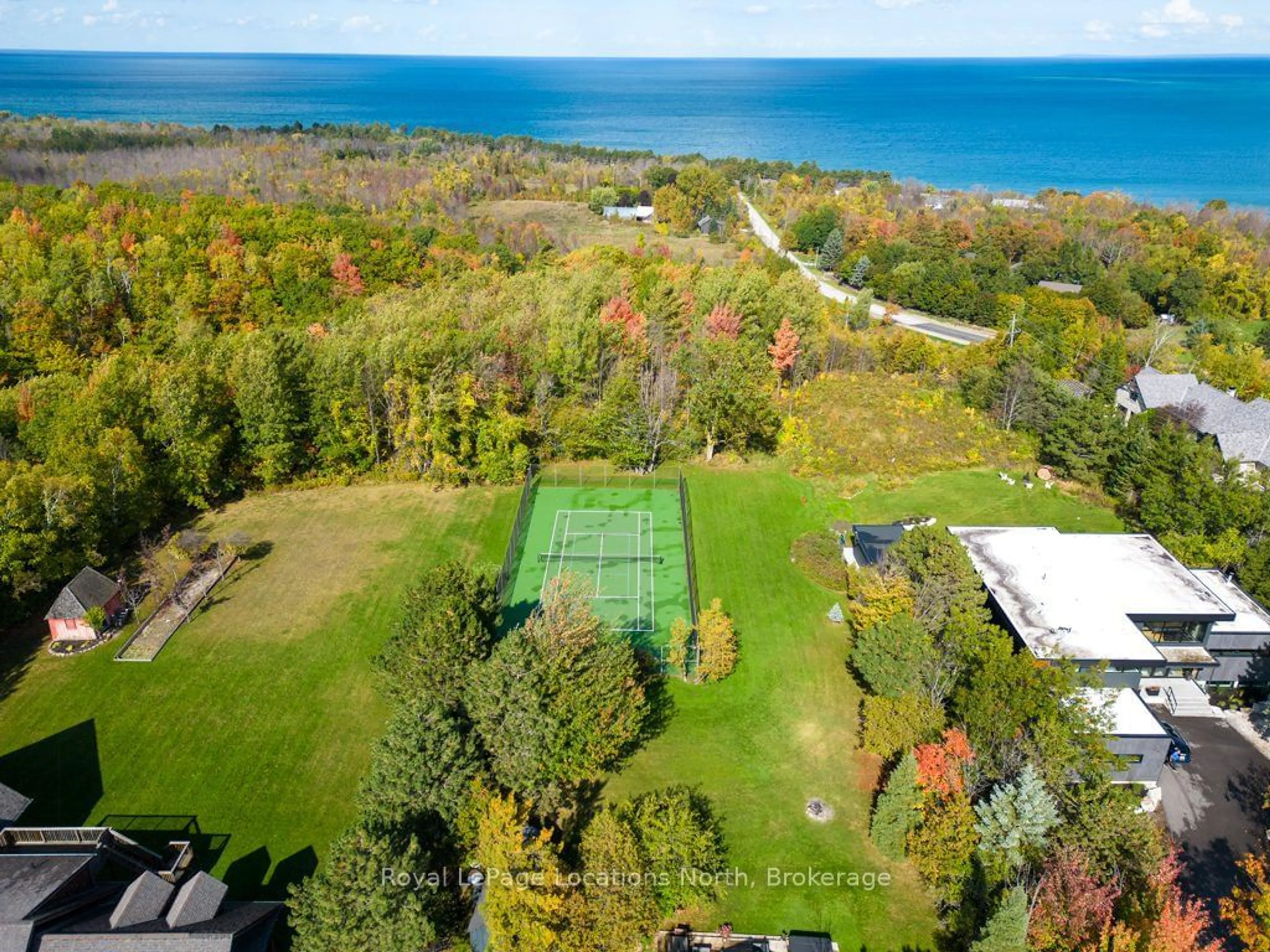 A pic from outside/outdoor area/front of a property/back of a property/a pic from drone, water/lake/river/ocean view for 107 Margaret Dr, Blue Mountains Ontario L9Y 0T5