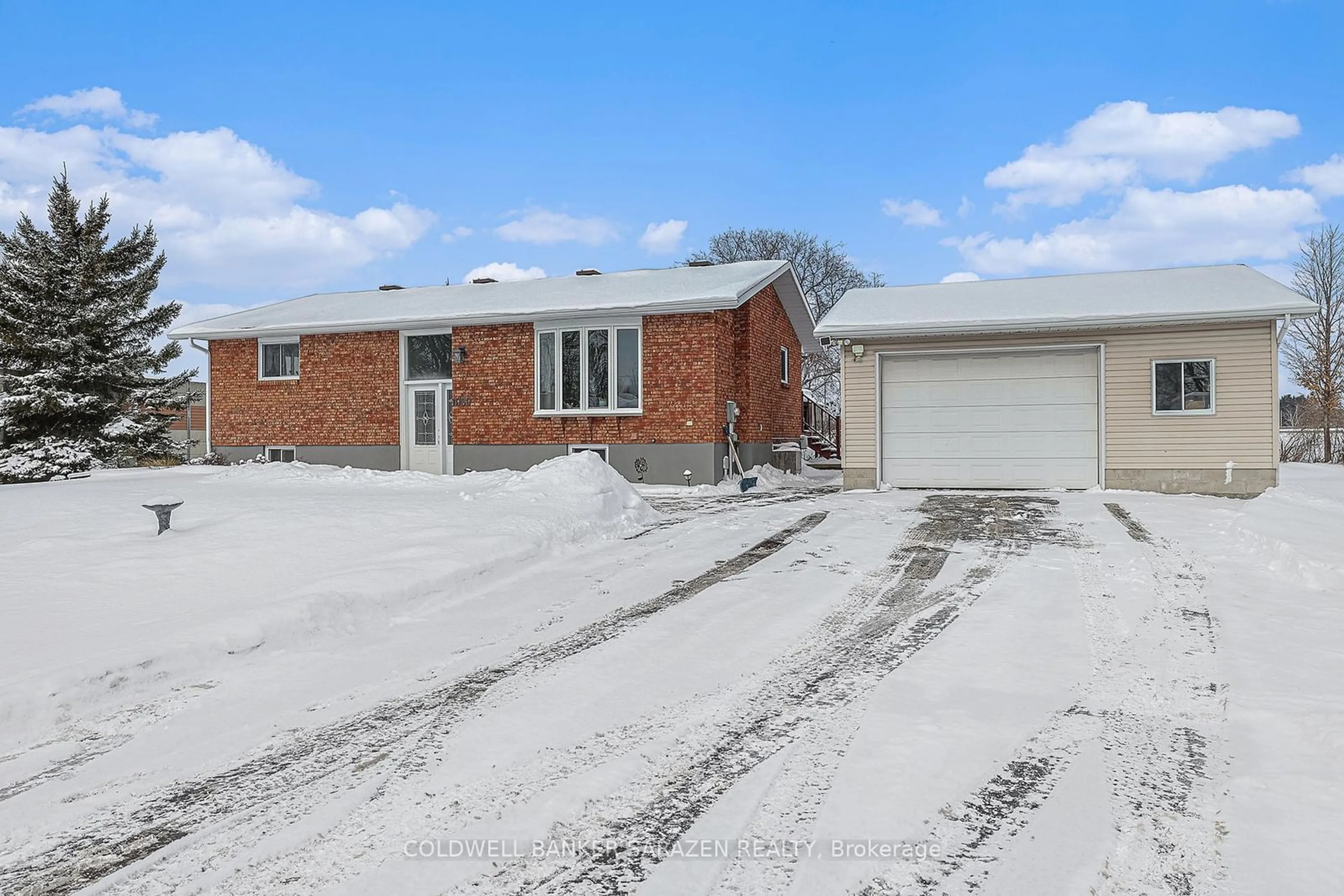 Home with brick exterior material, street for 1059 Flynn Ave, Carp - Dunrobin - Huntley - Fitzroy and Area Ontario K7S 3G7