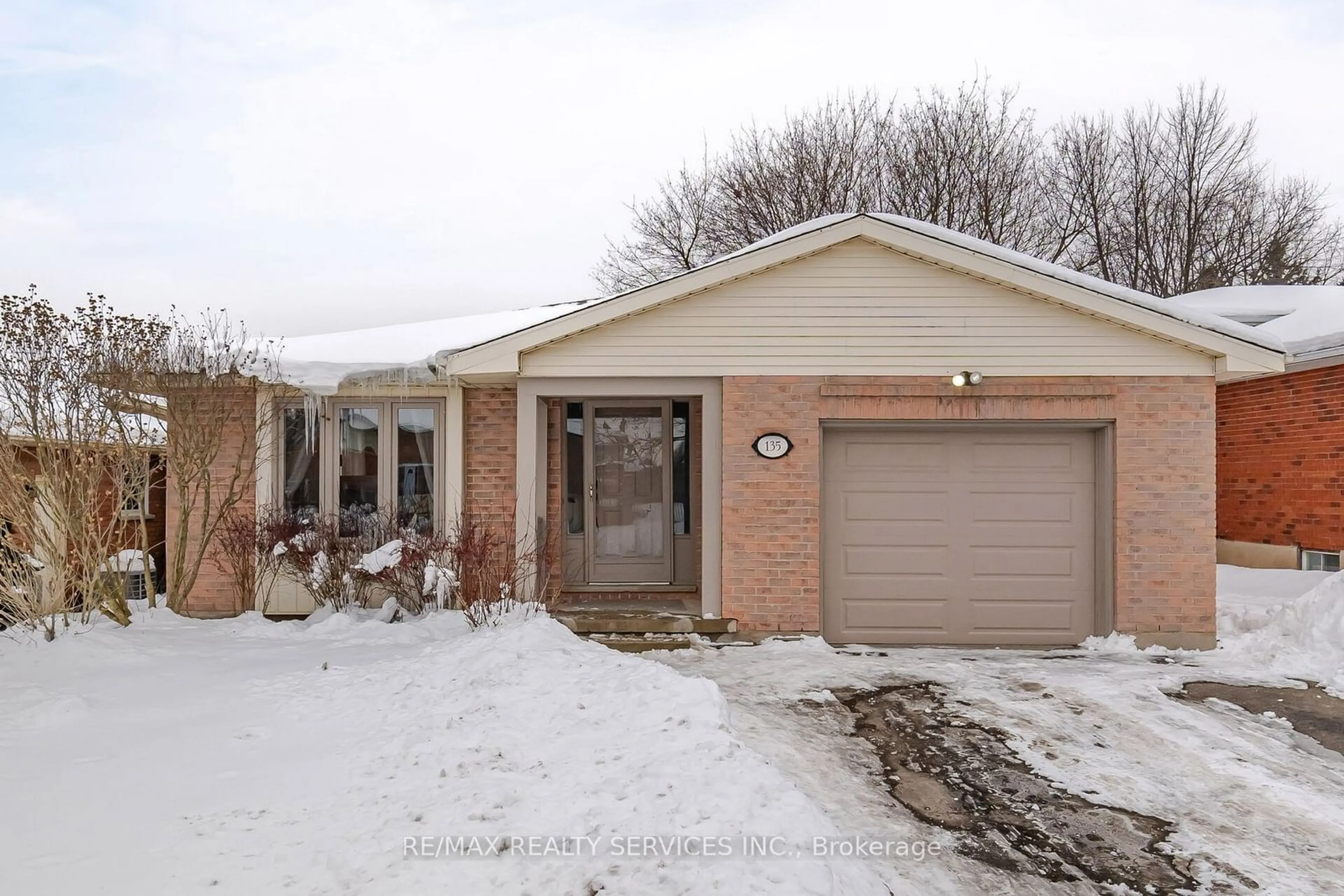 Home with brick exterior material, street for 135 Brierdale Dr, Kitchener Ontario N2A 3S8