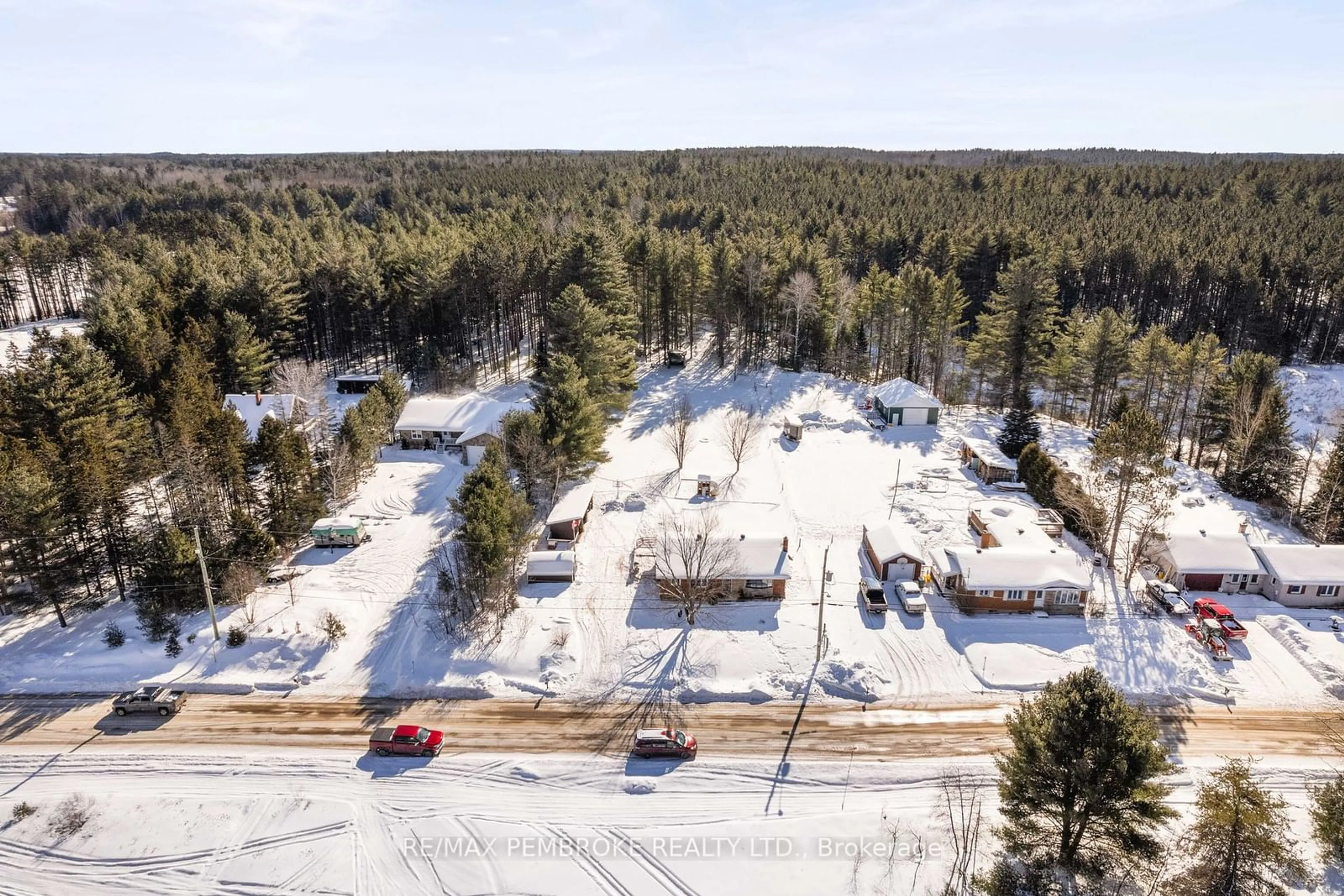 A pic from outside/outdoor area/front of a property/back of a property/a pic from drone, forest/trees view for 865 Black Bay Rd, Petawawa Ontario K8H 2W8