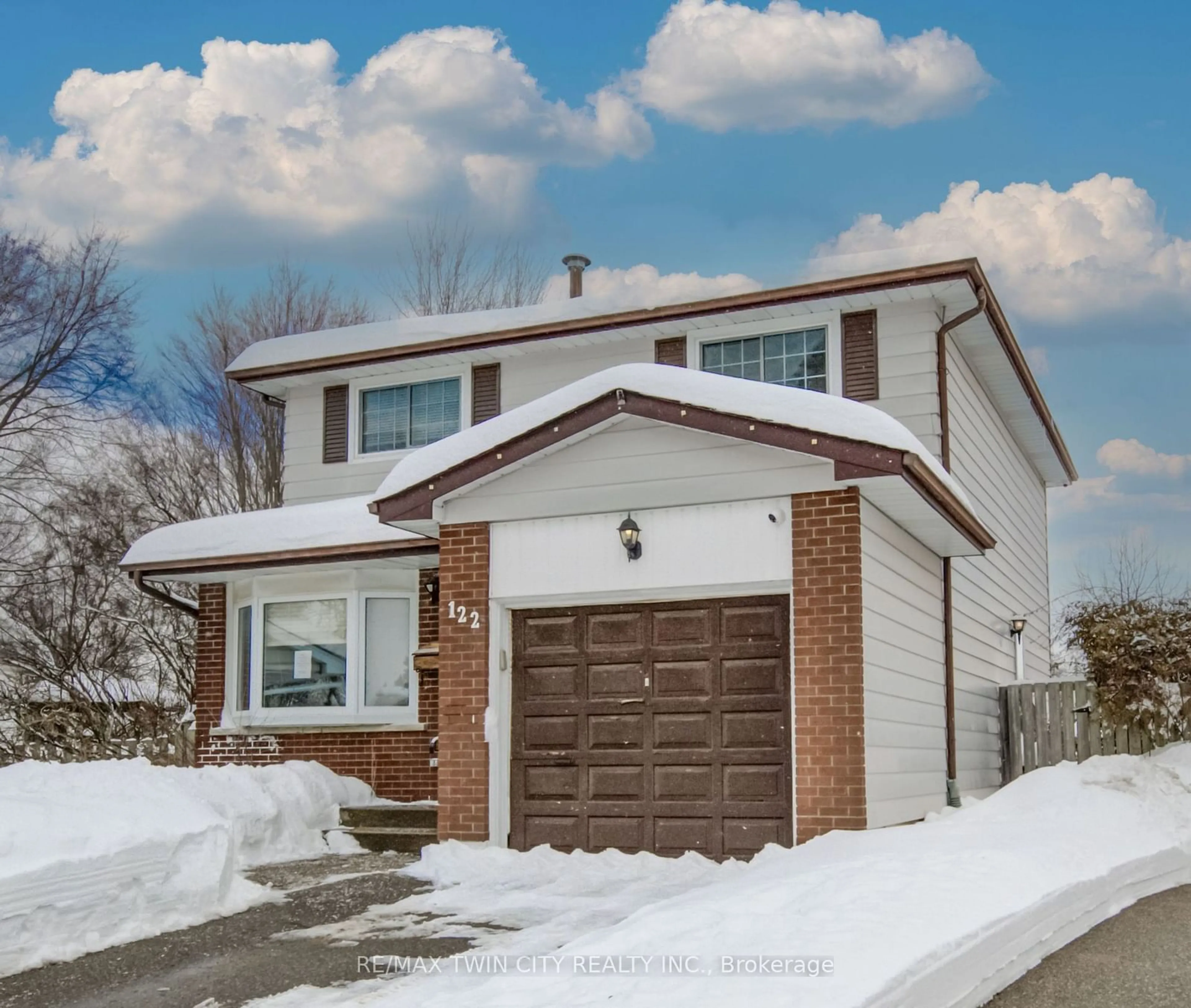 Home with brick exterior material, street for 122 FOREST GLEN Cres, Kitchener Ontario N2N 1C8