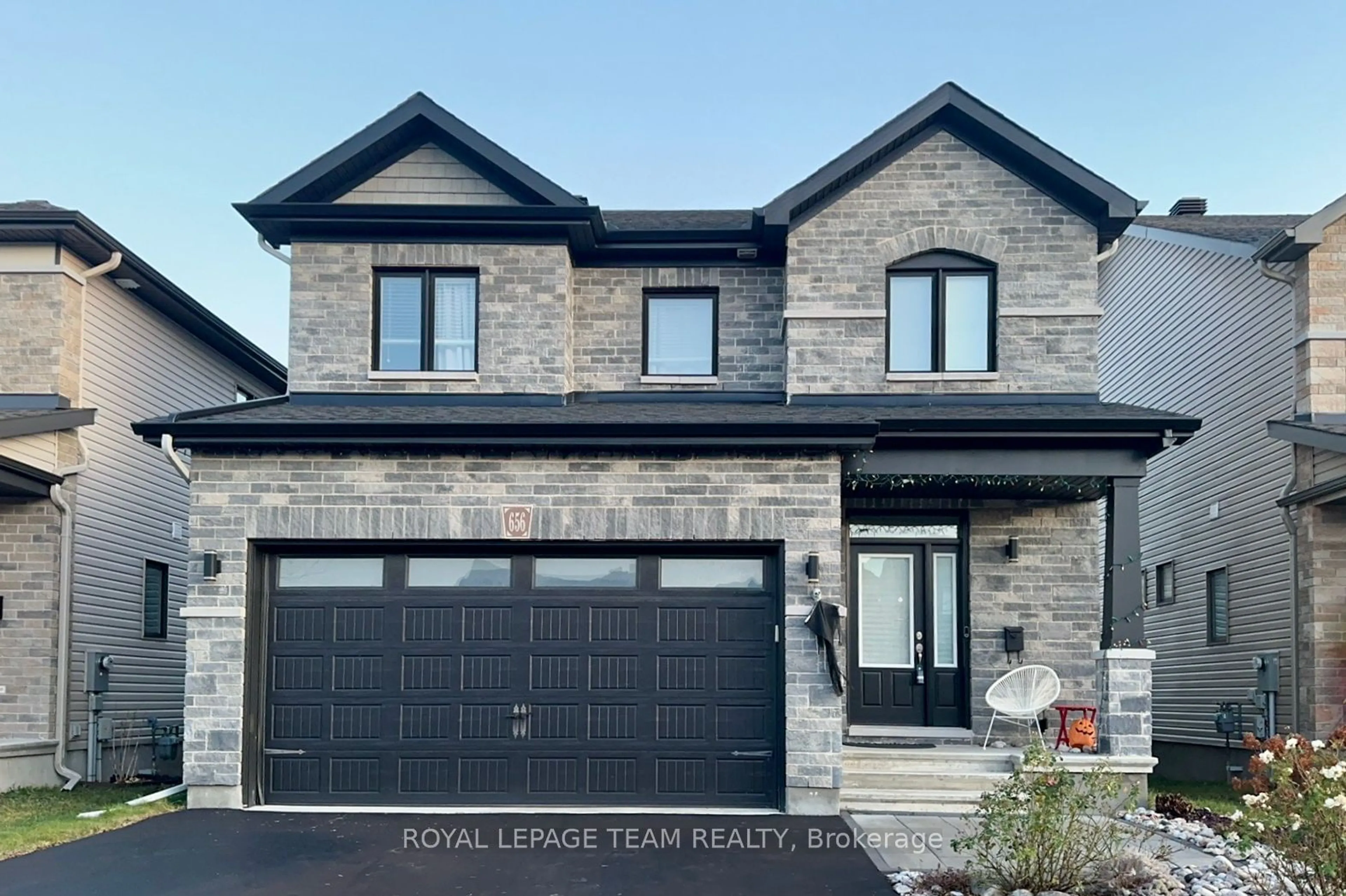 Home with brick exterior material, street for 656 PARADE Dr, Stittsville - Munster - Richmond Ontario K2S 0Y9