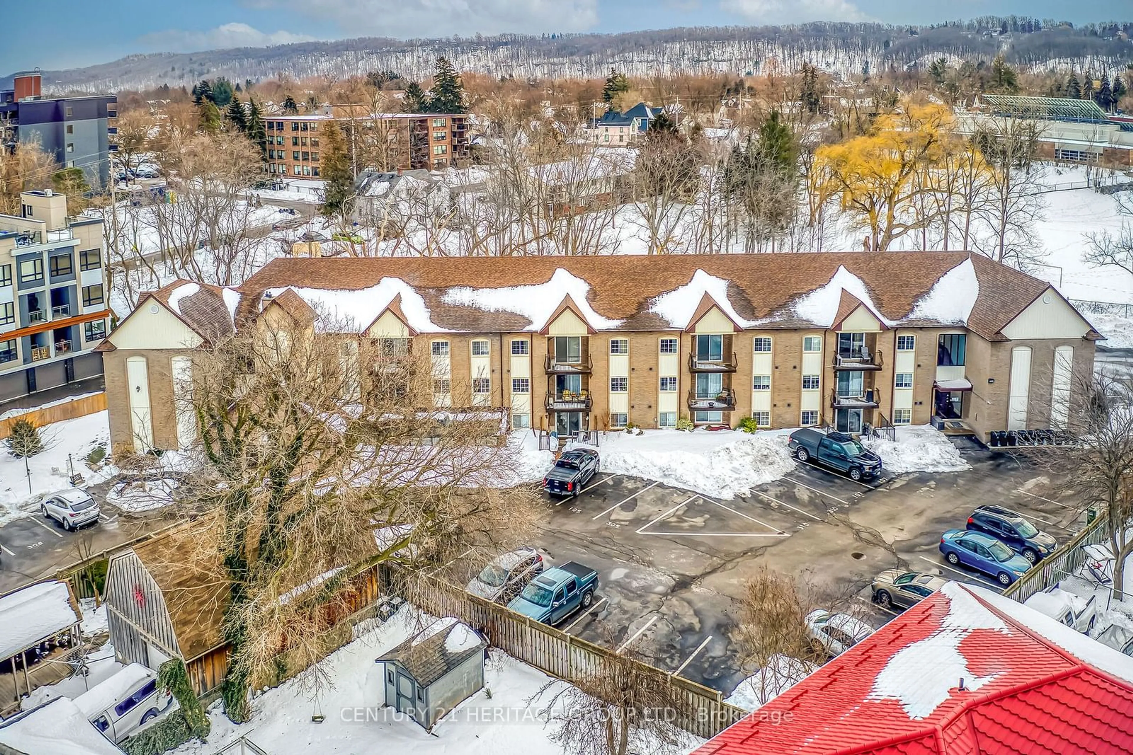 A pic from outside/outdoor area/front of a property/back of a property/a pic from drone, city buildings view from balcony for 20 John St ##207, Grimsby Ontario L3M 1X5