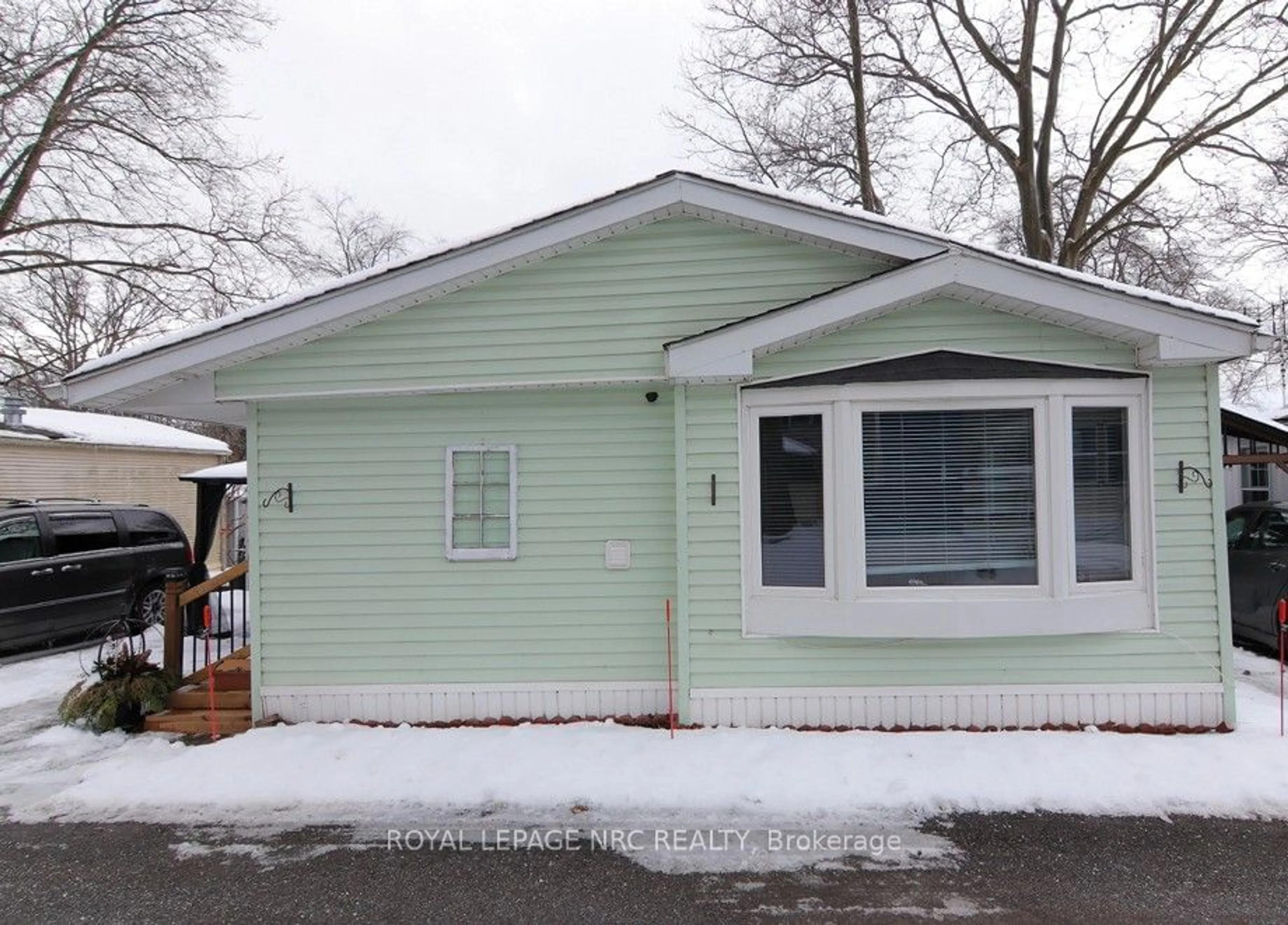 Home with vinyl exterior material, street for 23 Four Mile Creek Rd #426, Niagara-on-the-Lake Ontario L0S 1J1