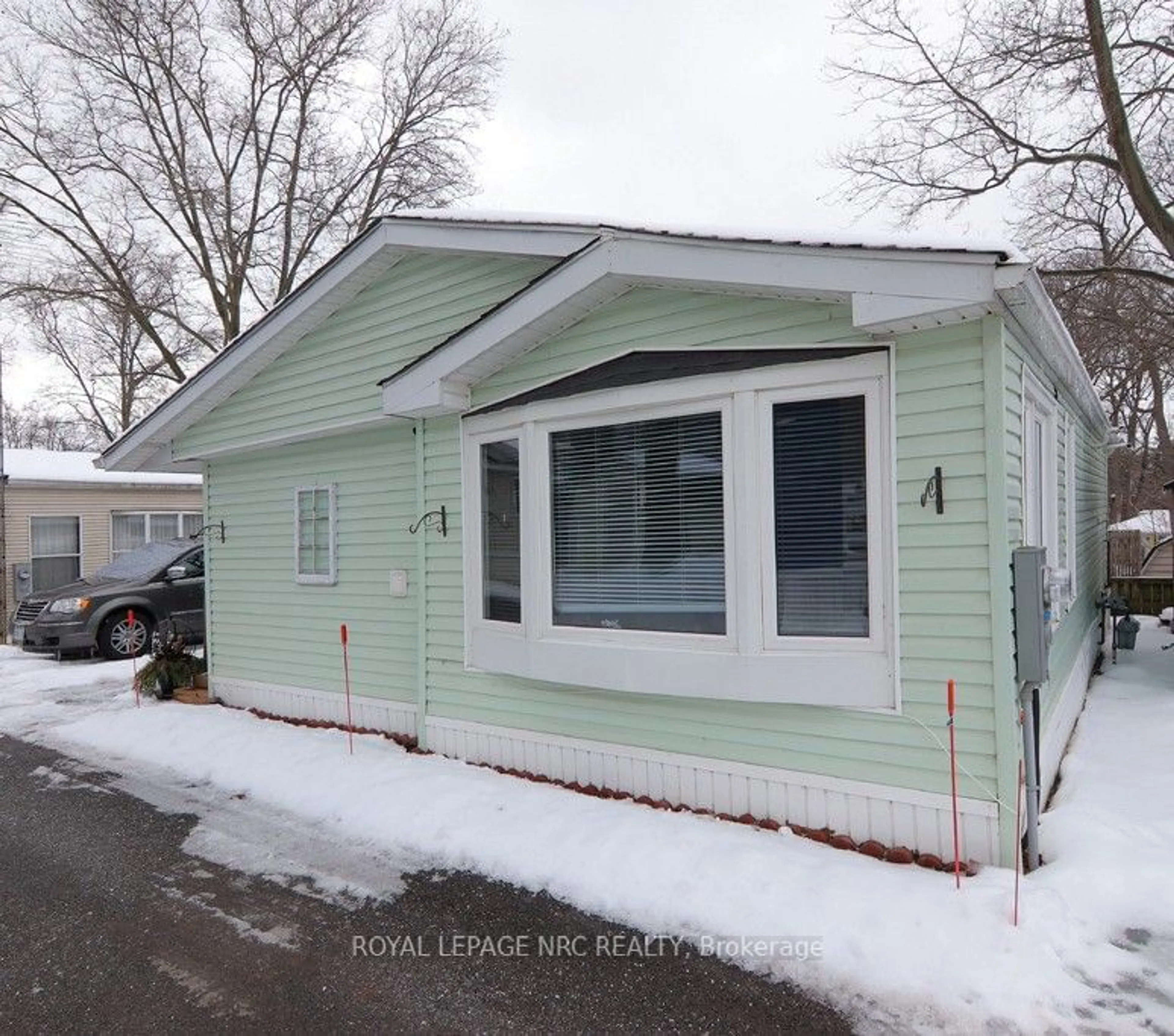 Home with vinyl exterior material, street for 23 Four Mile Creek Rd #426, Niagara-on-the-Lake Ontario L0S 1J1