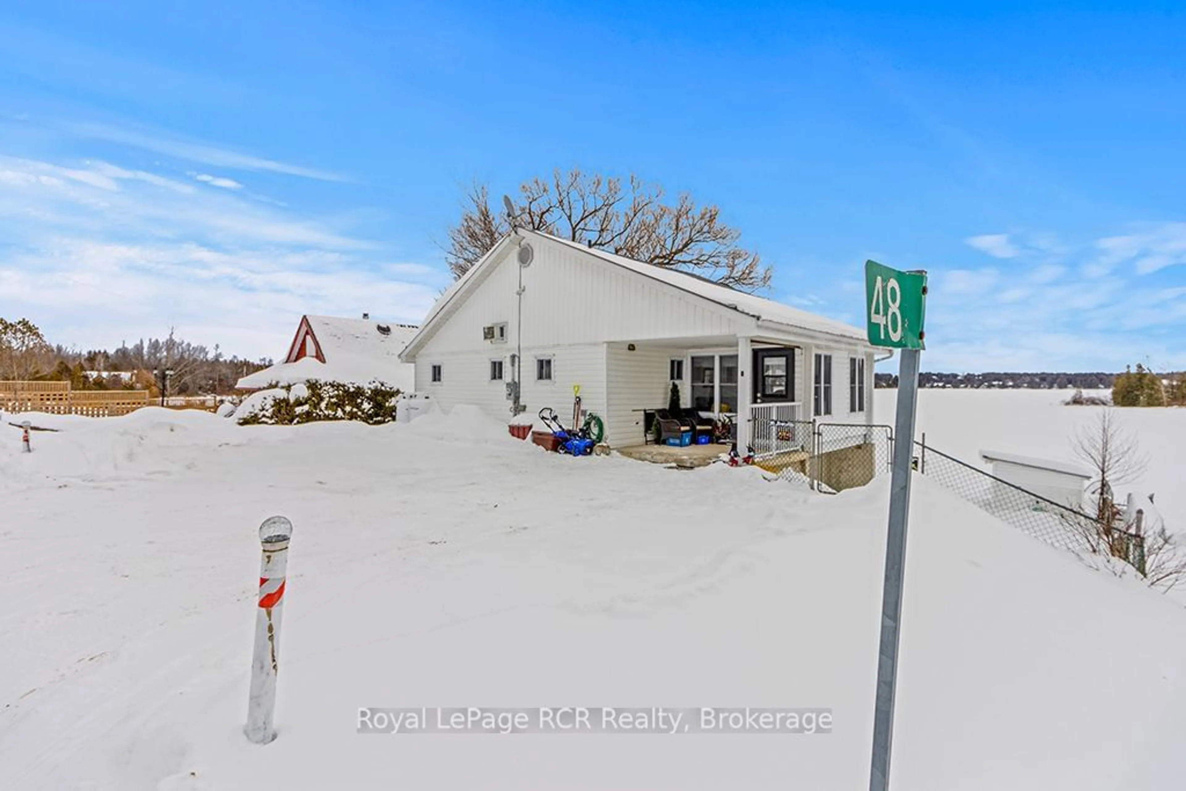 A pic from outside/outdoor area/front of a property/back of a property/a pic from drone, street for 48 Island View Dr, South Bruce Peninsula Ontario N0H 1A0