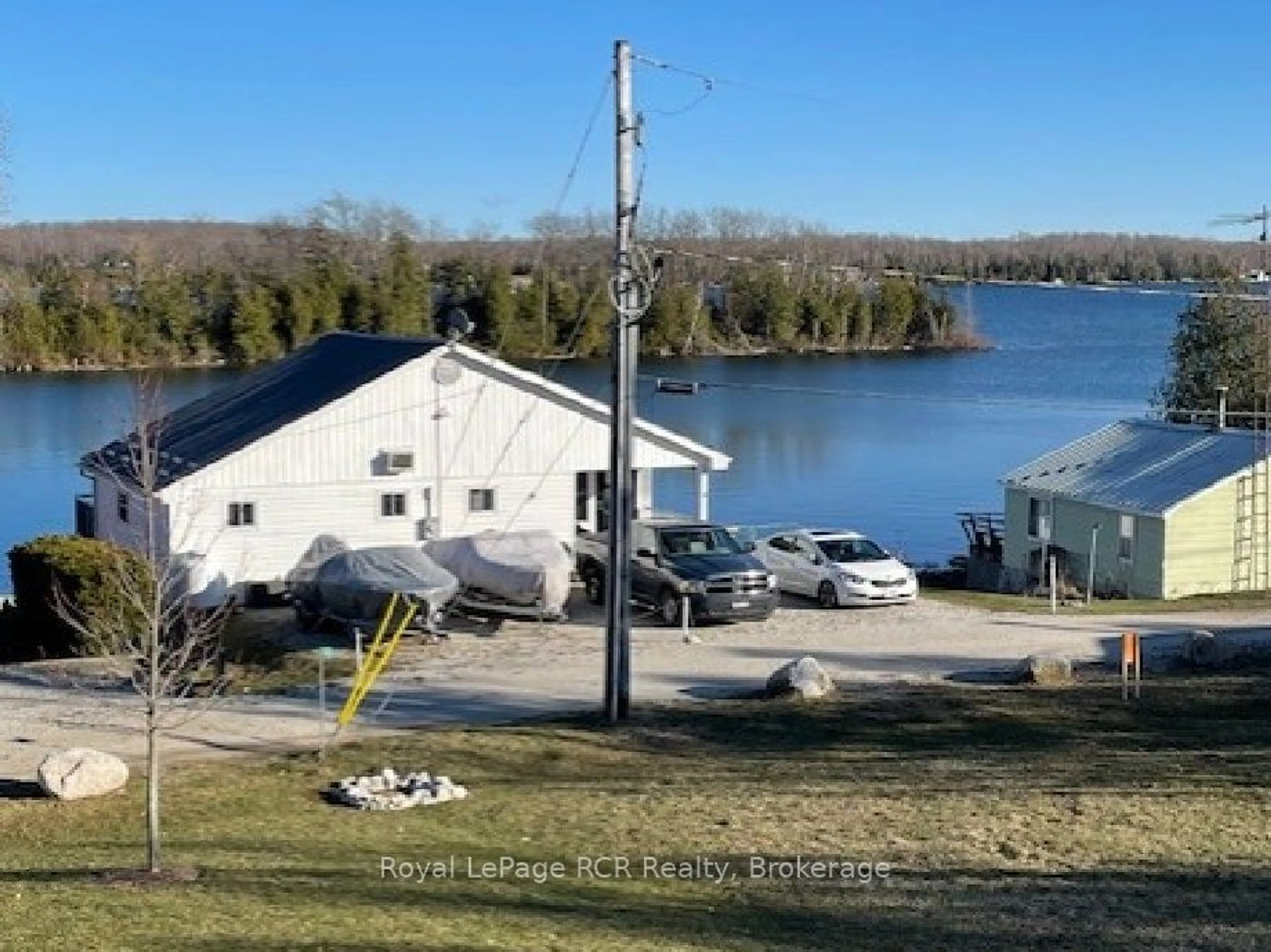 A pic from outside/outdoor area/front of a property/back of a property/a pic from drone, water/lake/river/ocean view for 48 Island View Dr, South Bruce Peninsula Ontario N0H 1A0