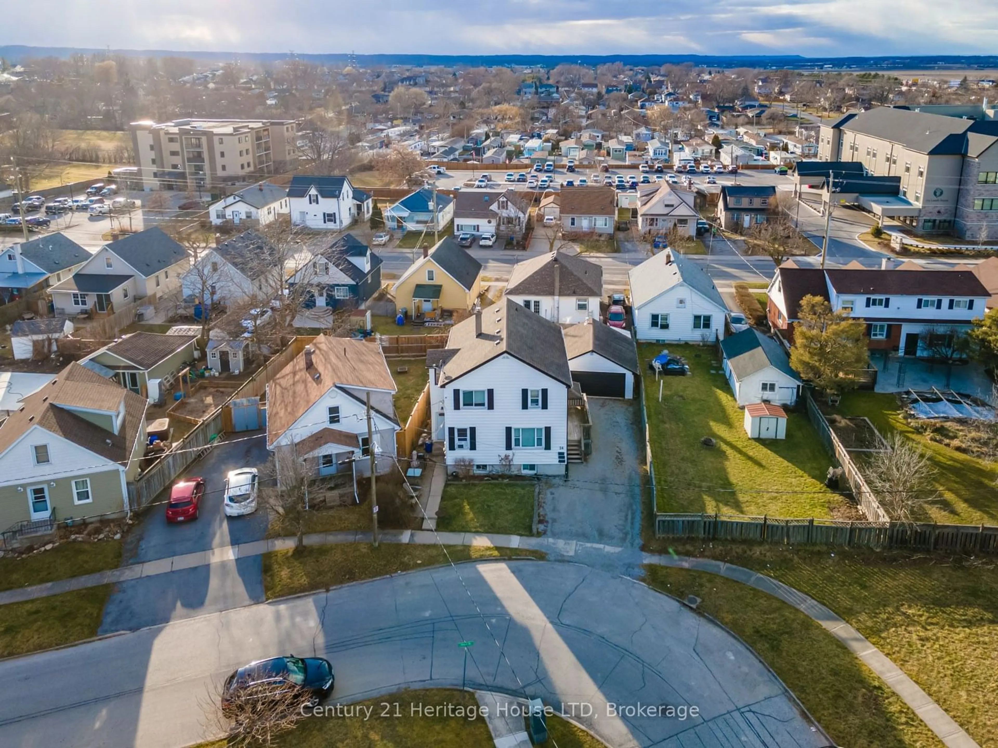 A pic from outside/outdoor area/front of a property/back of a property/a pic from drone, street for 24 Union St, St. Catharines Ontario L2S 2R2