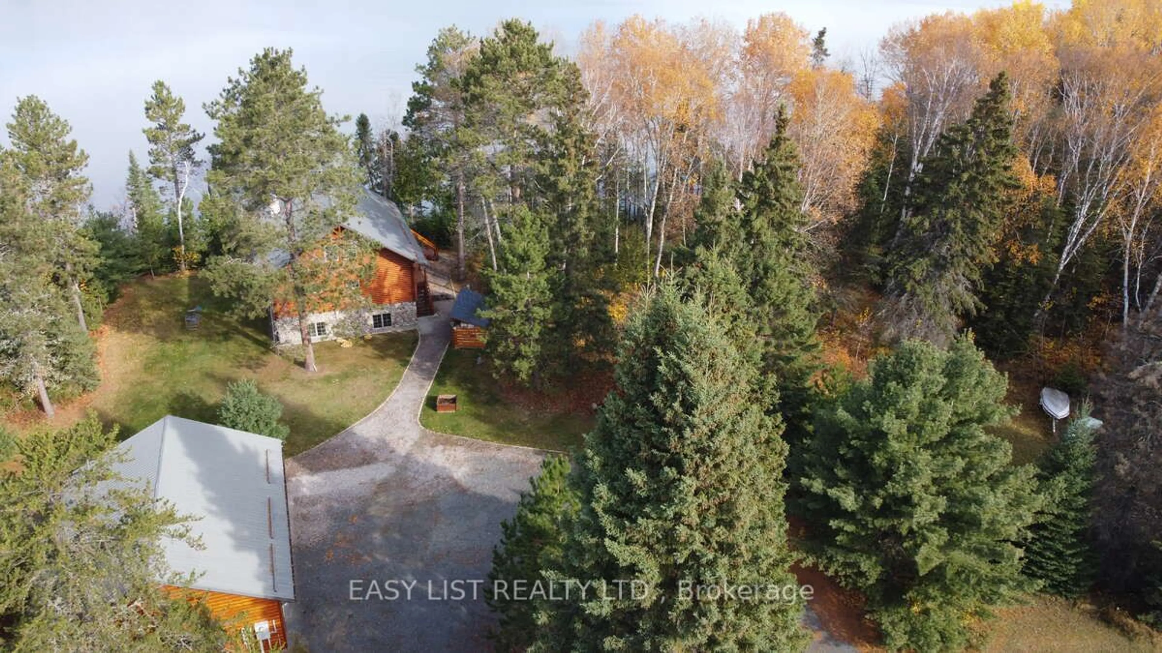 A pic from outside/outdoor area/front of a property/back of a property/a pic from drone, forest/trees view for 1780 Southshore Dr, Sioux Lookout Ontario P8T 0A7