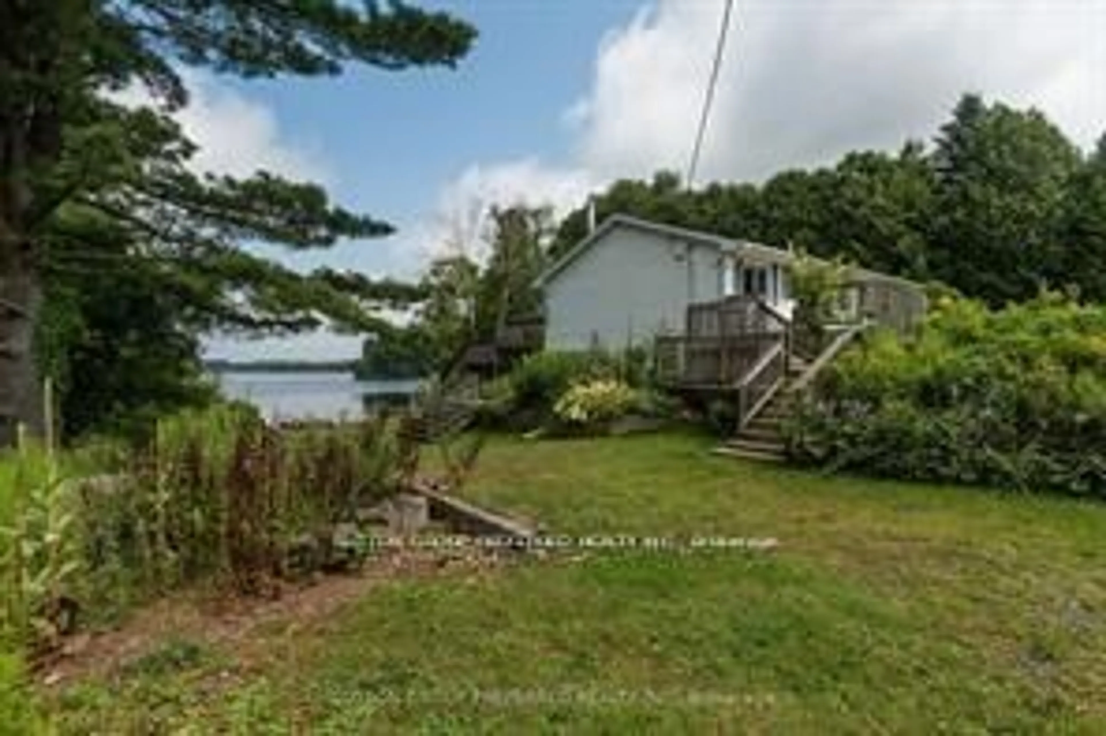 A pic from outside/outdoor area/front of a property/back of a property/a pic from drone, water/lake/river/ocean view for 14 Jordan Lane, Seguin Ontario P2A 0B2