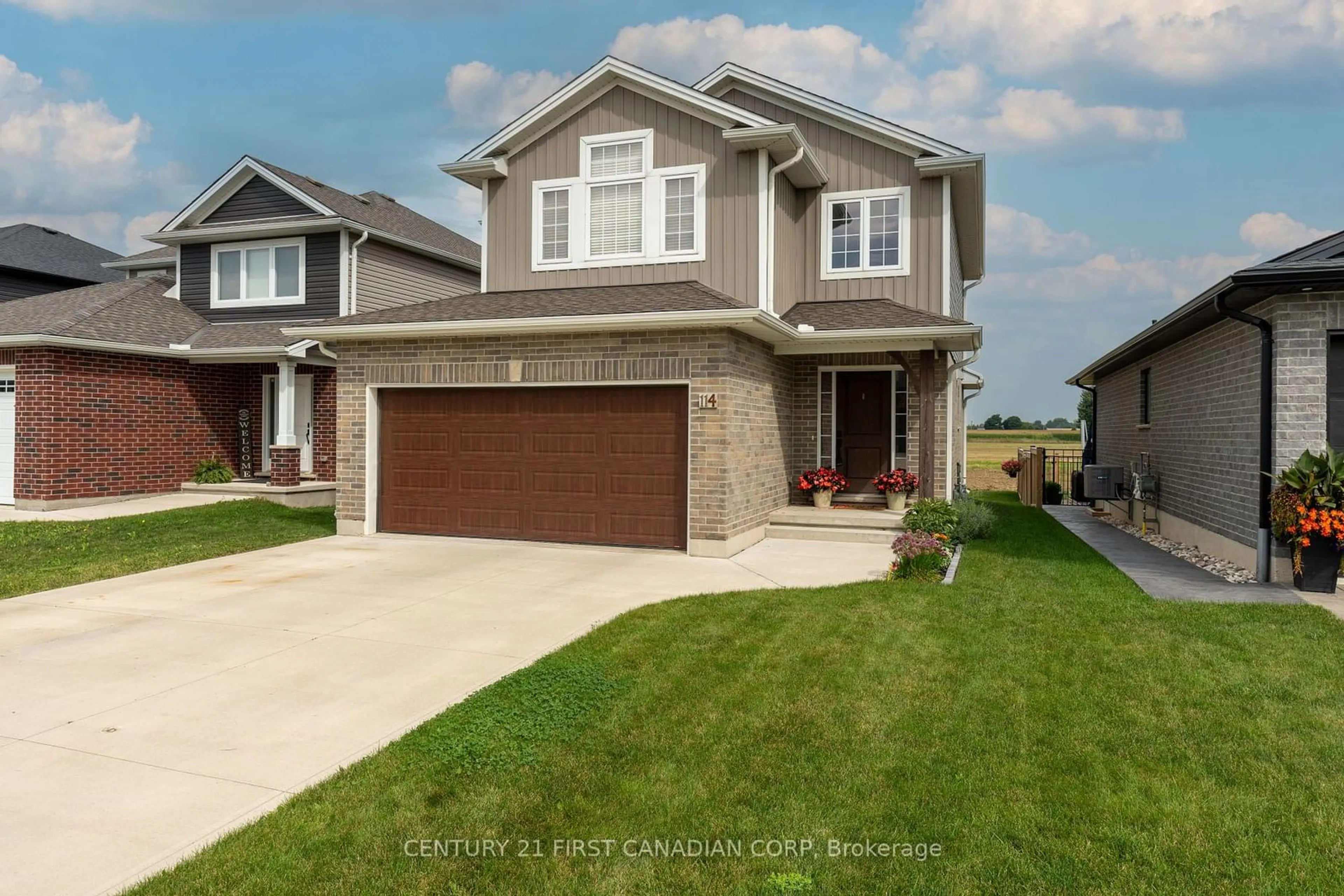 Home with brick exterior material, street for 114 Gilmour Dr, Lucan Biddulph Ontario N0M 2J0