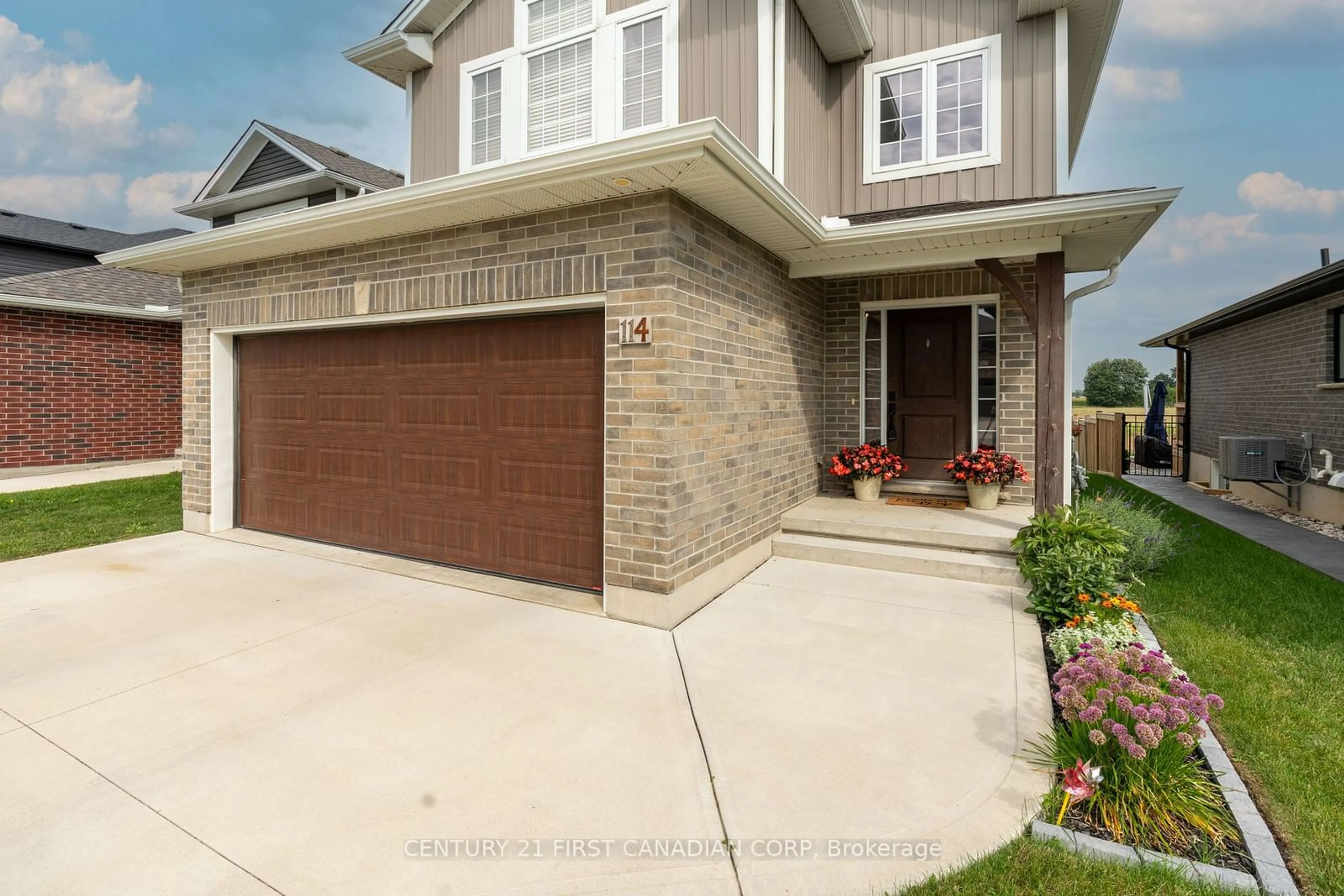 Home with brick exterior material, street for 114 Gilmour Dr, Lucan Biddulph Ontario N0M 2J0