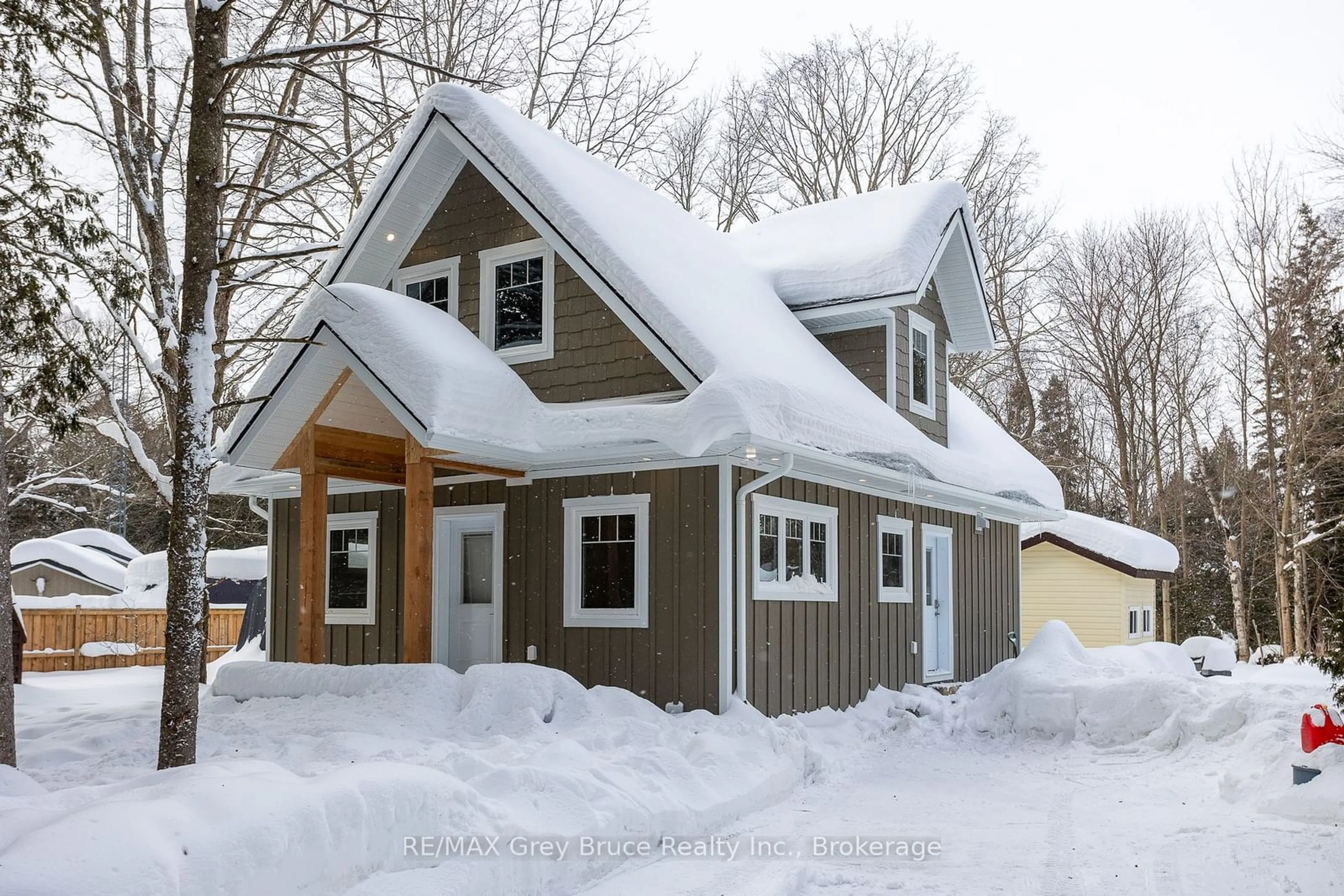 Home with vinyl exterior material, street for 457 Huron Rd Rd, South Bruce Peninsula Ontario N0H 2T0