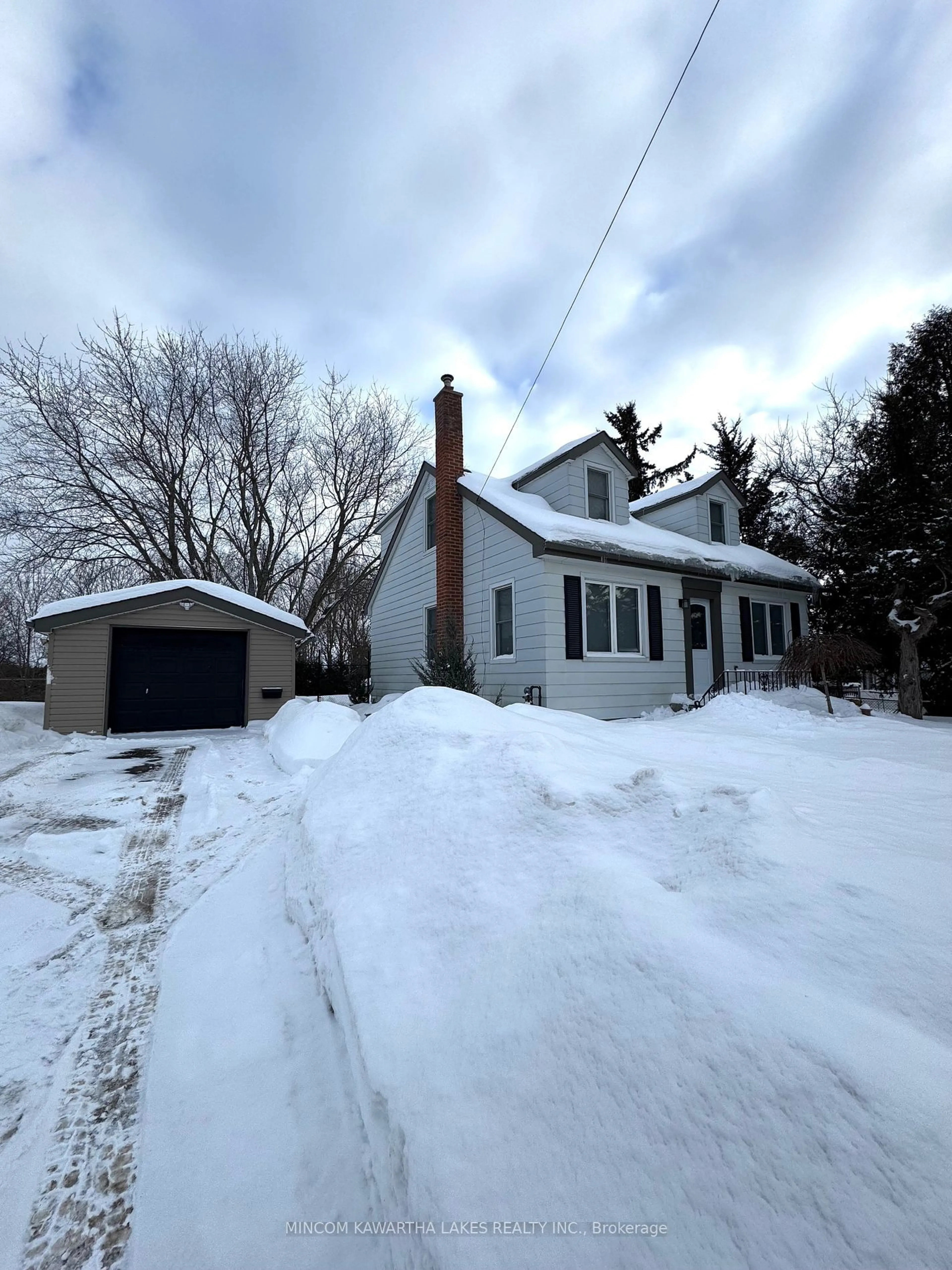 A pic from outside/outdoor area/front of a property/back of a property/a pic from drone, street for 129 County Rd 4 Rd, Douro-Dummer Ontario K9L 1V3