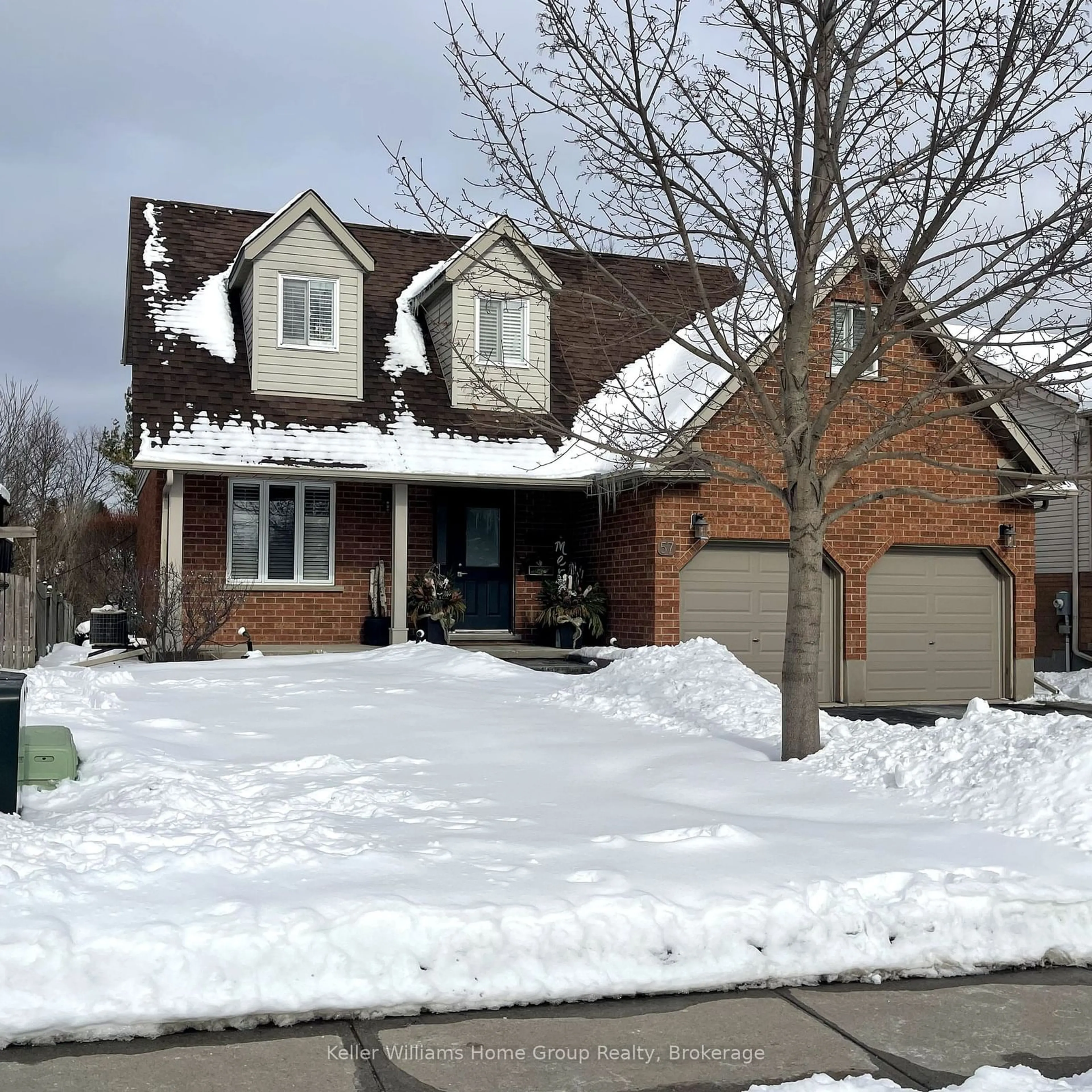 Home with brick exterior material, street for 57 Flaherty Dr, Guelph Ontario N1H 8K6