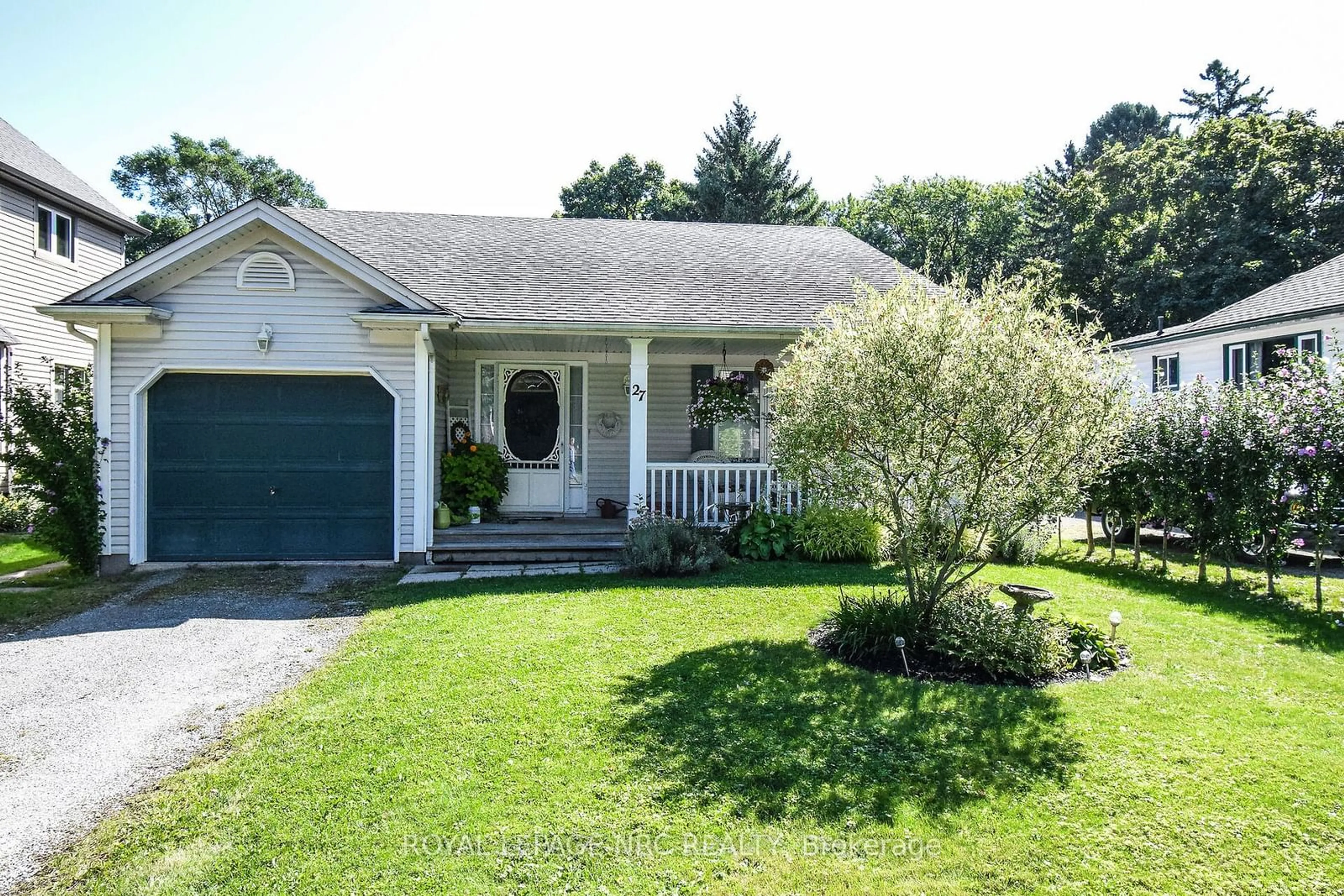 Home with vinyl exterior material, street for 27 Chestnut St, Pelham Ontario L0S 1E3