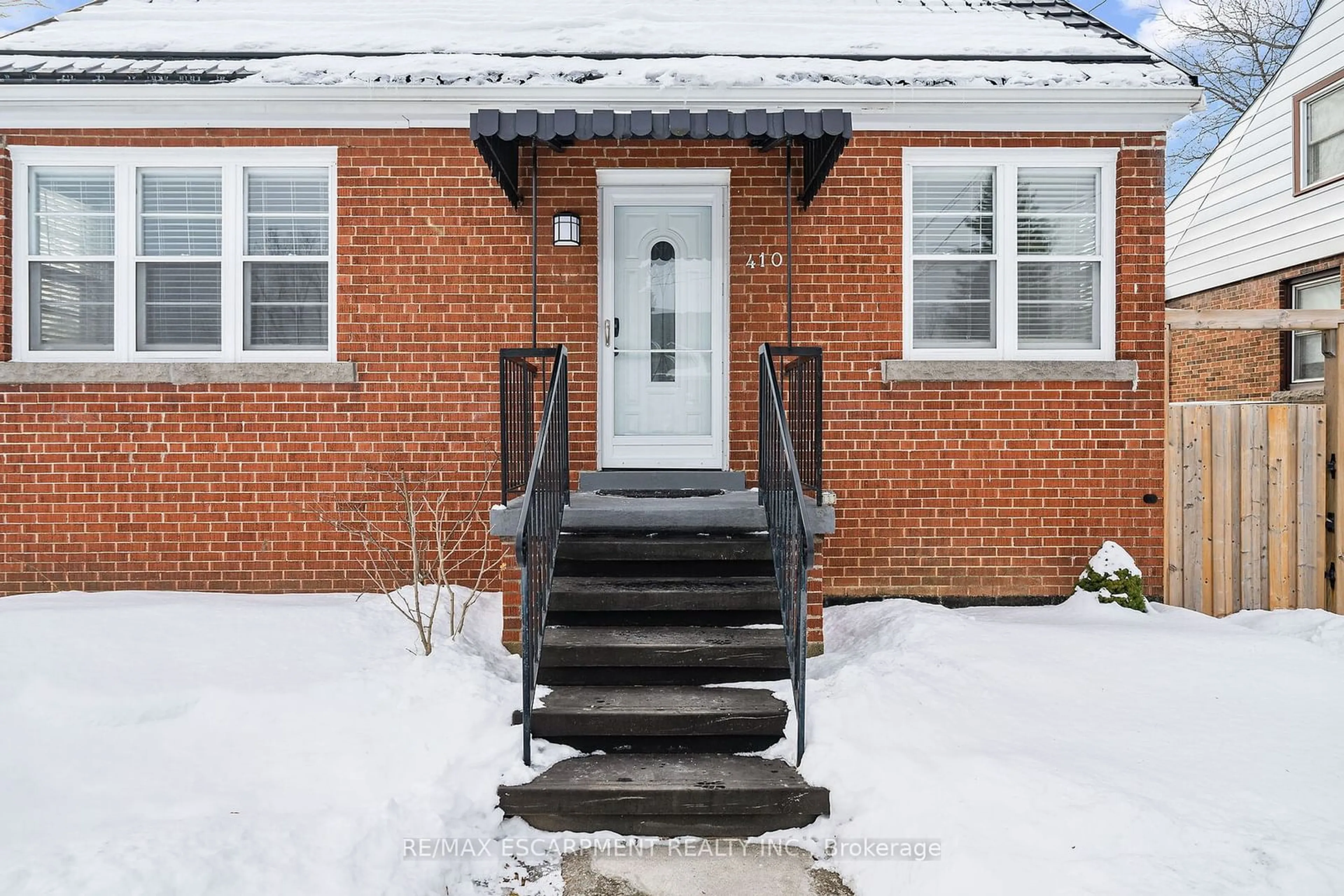 Home with brick exterior material, street for 410 Crockett St, Hamilton Ontario L8V 1J1