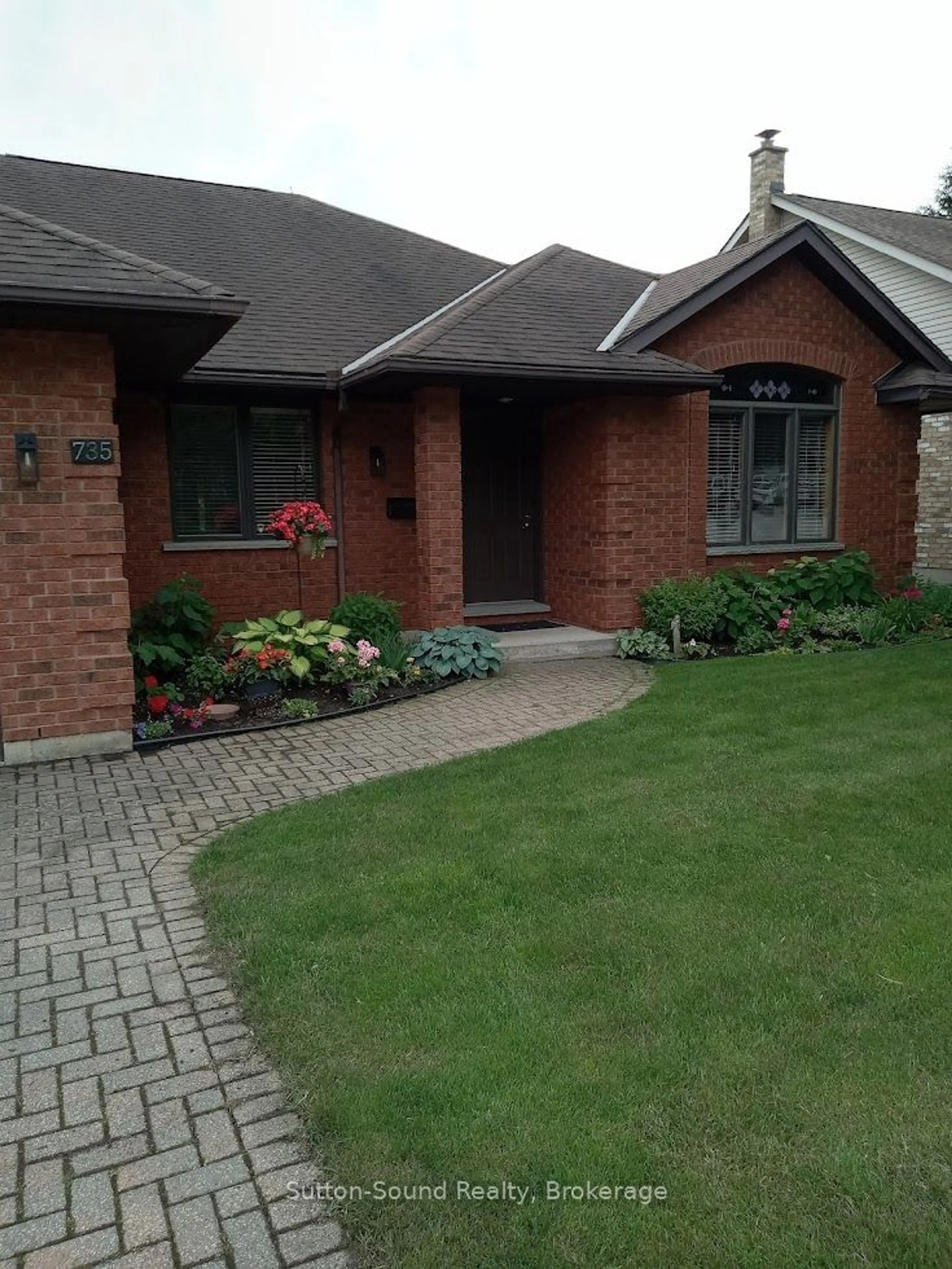 Home with brick exterior material, street for 735 15th St. A West St, Owen Sound Ontario N4K 6V7