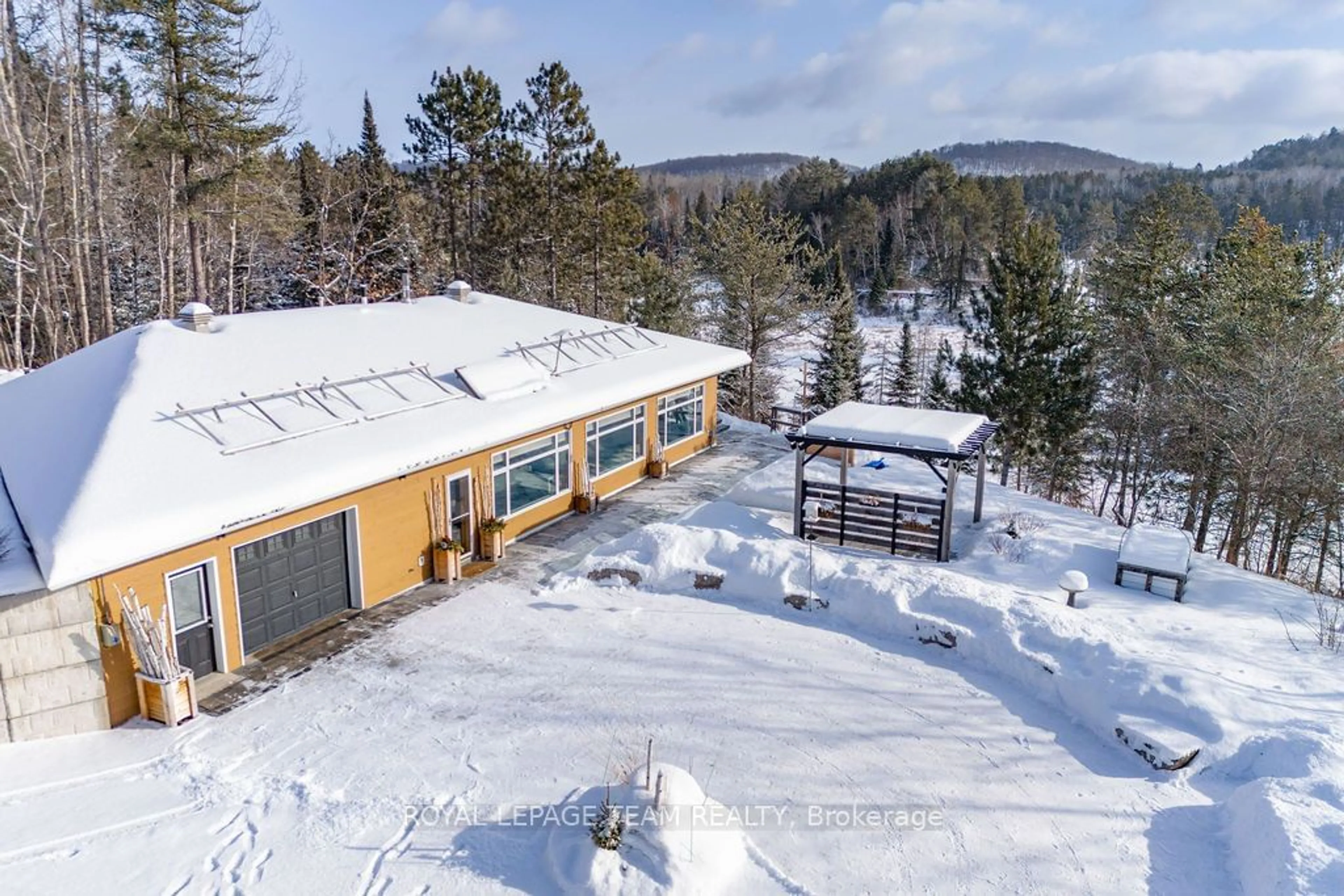 A pic from outside/outdoor area/front of a property/back of a property/a pic from drone, mountain view for 188 Paugh Lake Rd, Madawaska Valley Ontario K0J 1B0