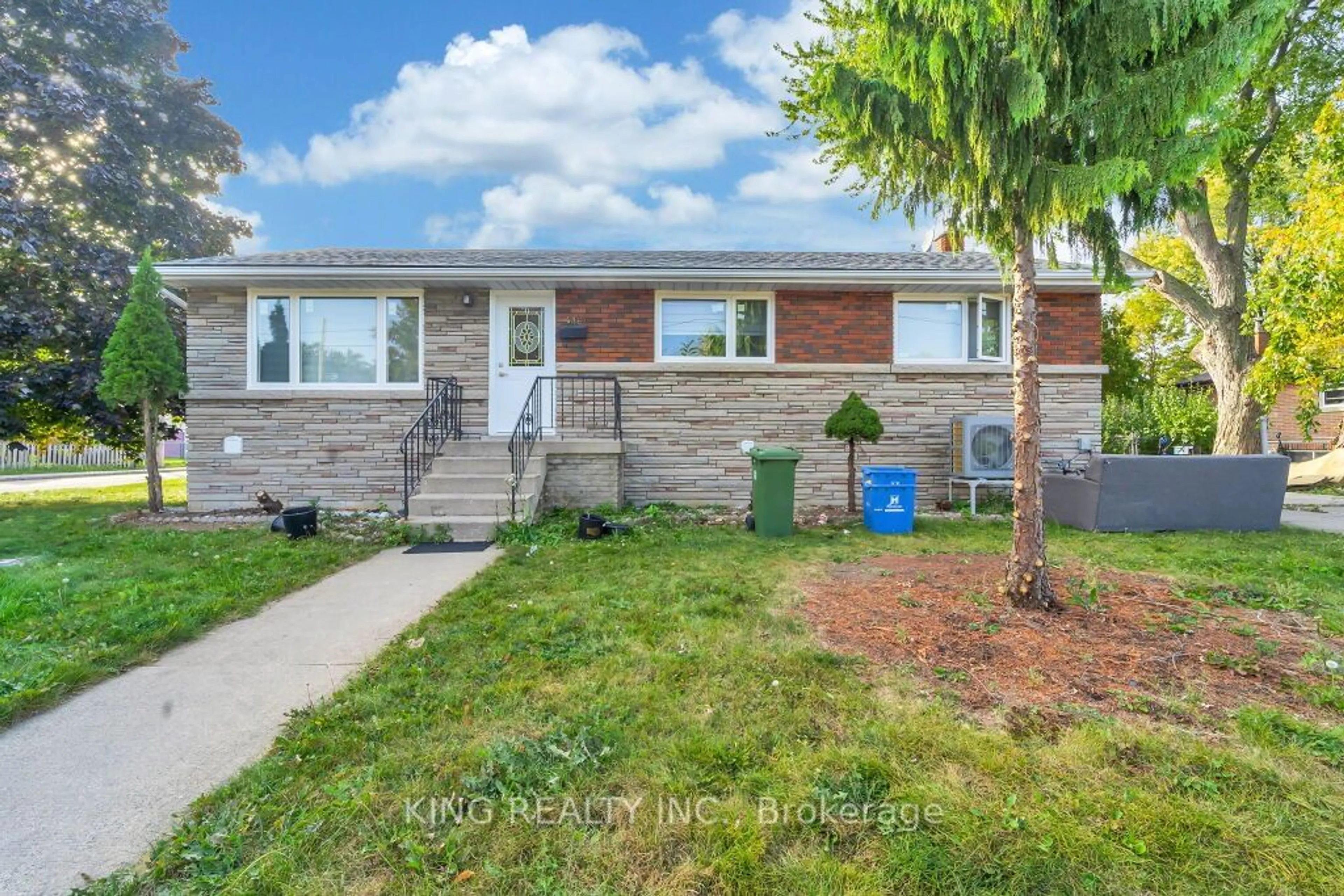 Home with brick exterior material, street for 436 East 14th St, Hamilton Ontario L9A 4C5