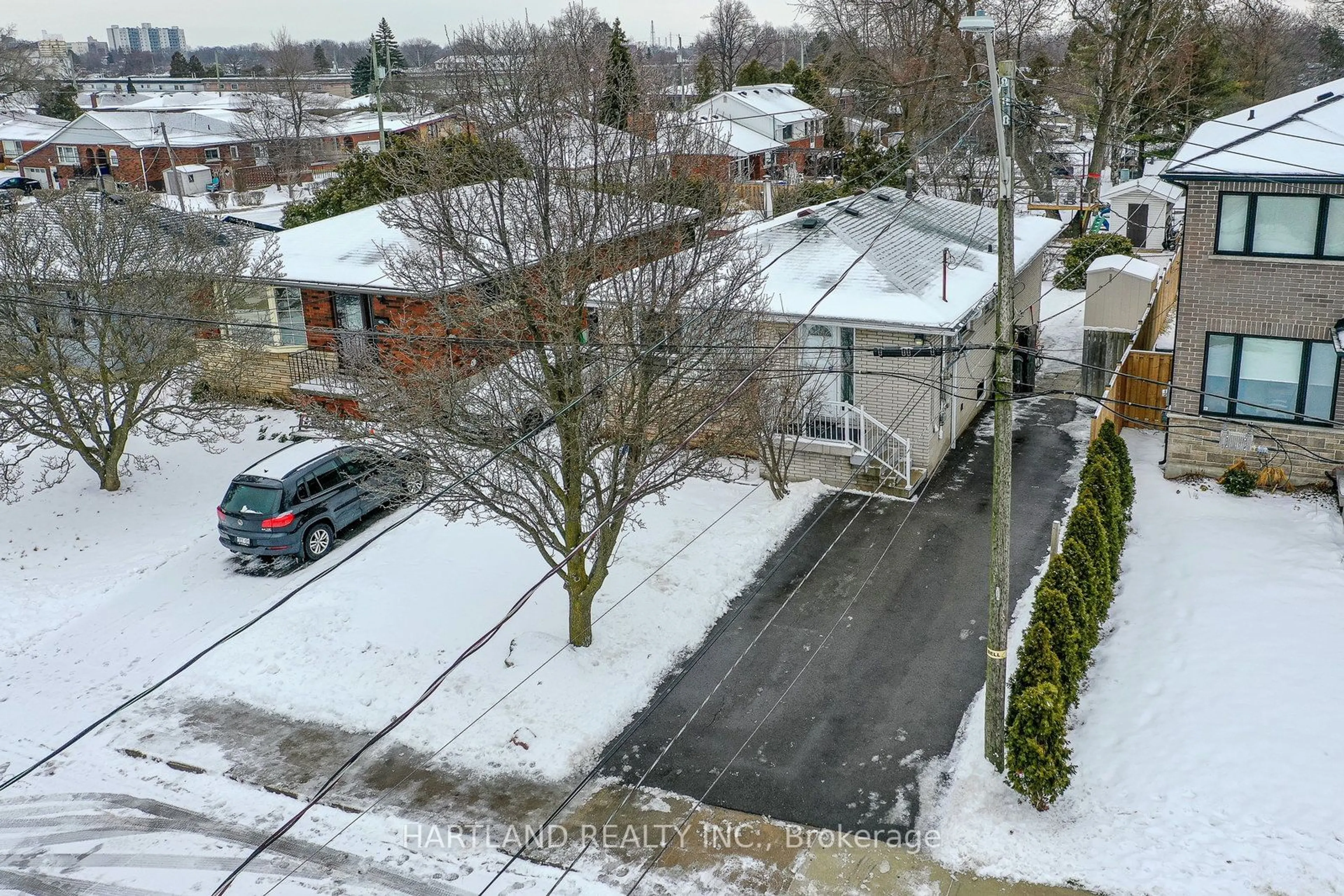 A pic from outside/outdoor area/front of a property/back of a property/a pic from drone, street for 11 Maitland Ave, Hamilton Ontario L9A 3J4