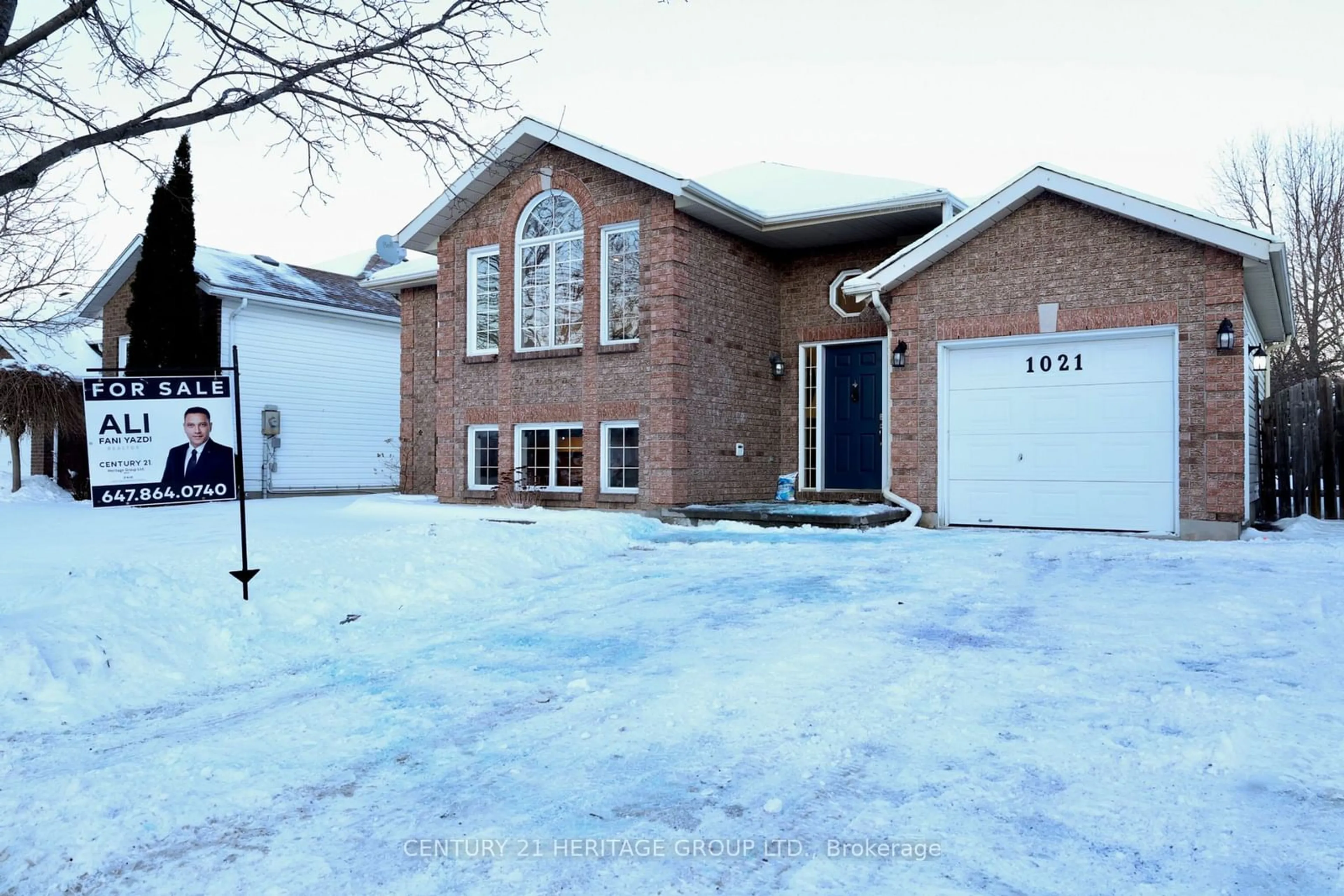 Home with brick exterior material, street for 1021 Greenwood Park Dr, Kingston Ontario K7K 7C2