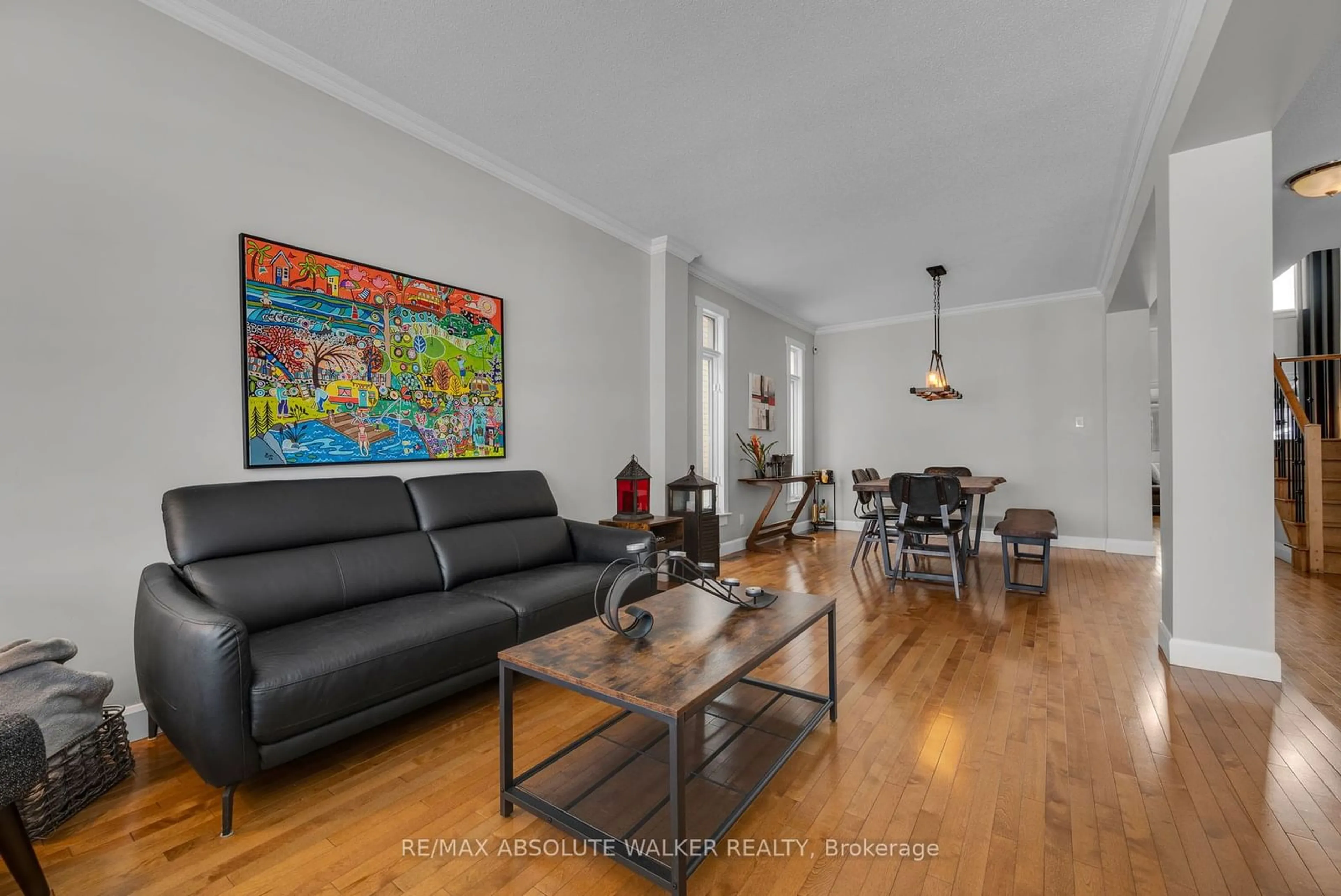 Living room with furniture, wood/laminate floor for 2012 Calico Cres, Orleans - Cumberland and Area Ontario K4A 4L7