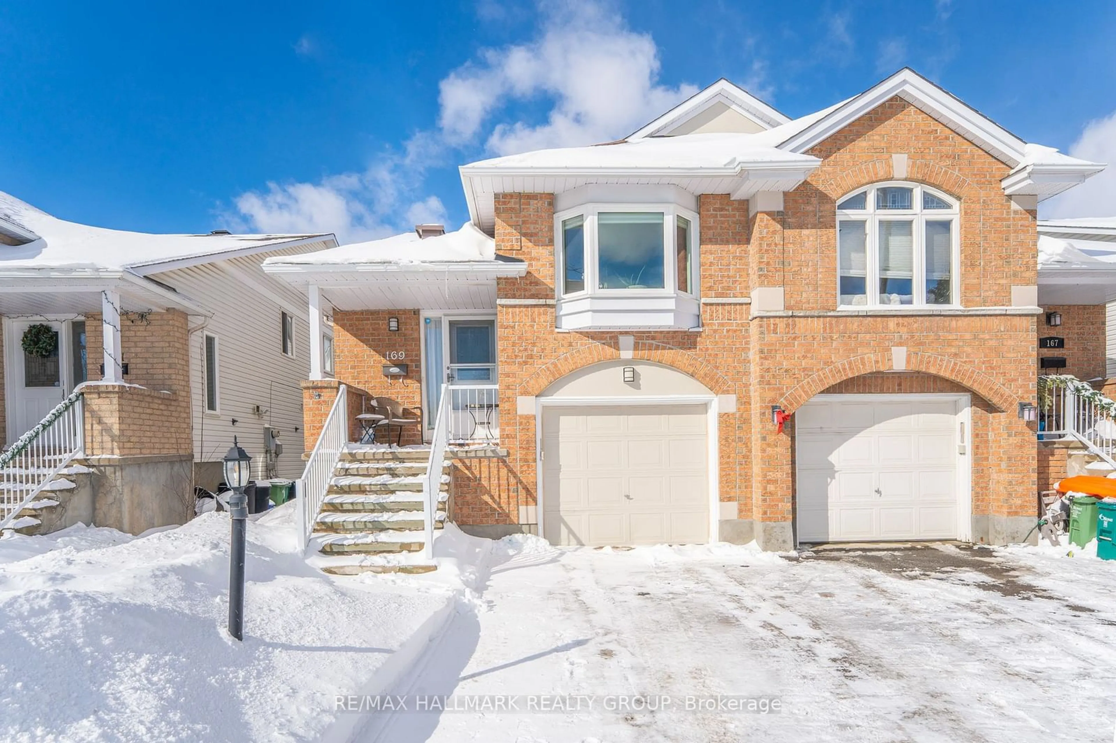 Home with brick exterior material, street for 169 Mountshannon Dr, Barrhaven Ontario K2J 4M9