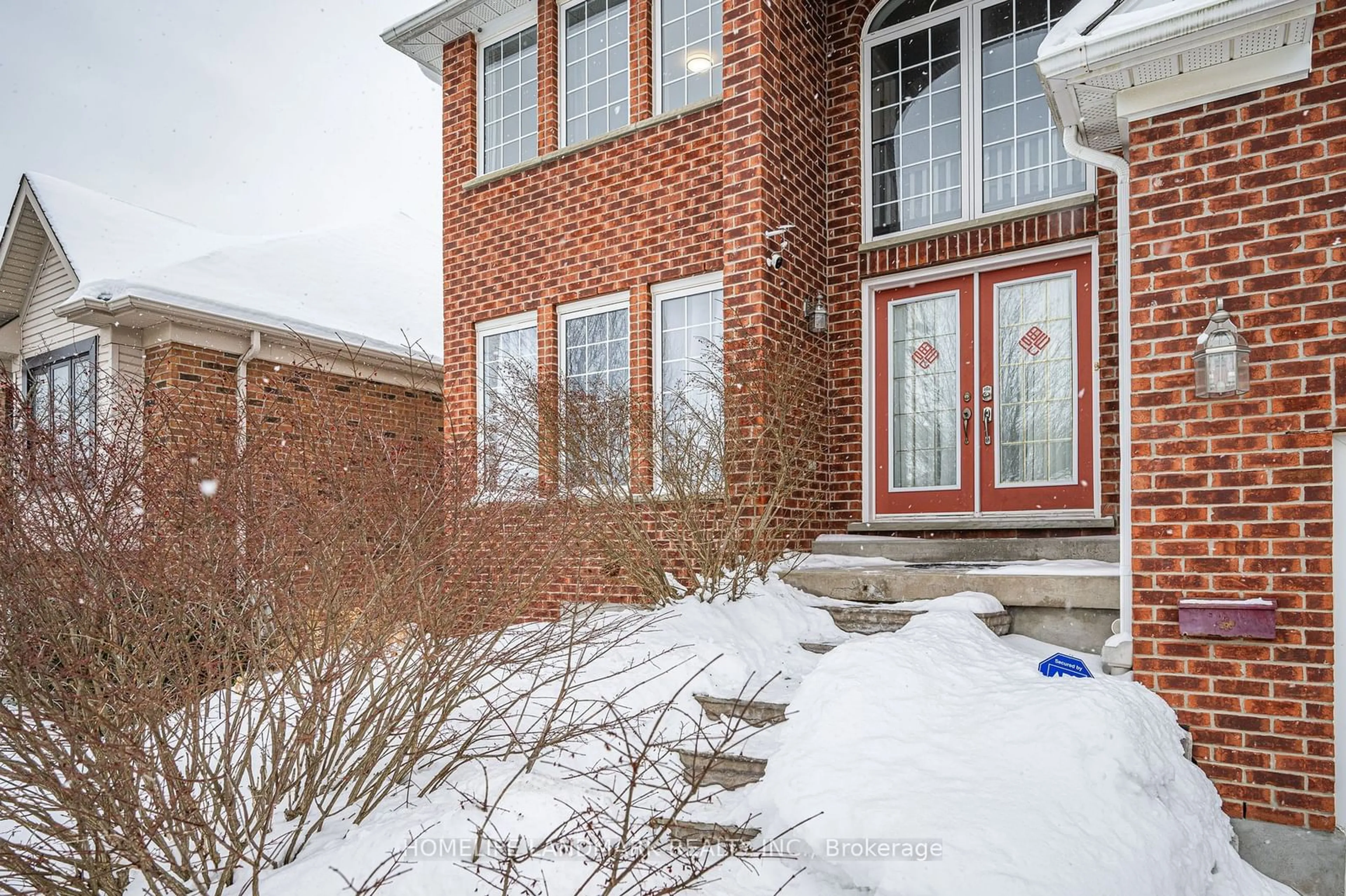 Home with brick exterior material, street for 227 The Lions Gate, Waterloo Ontario N2L 6M6