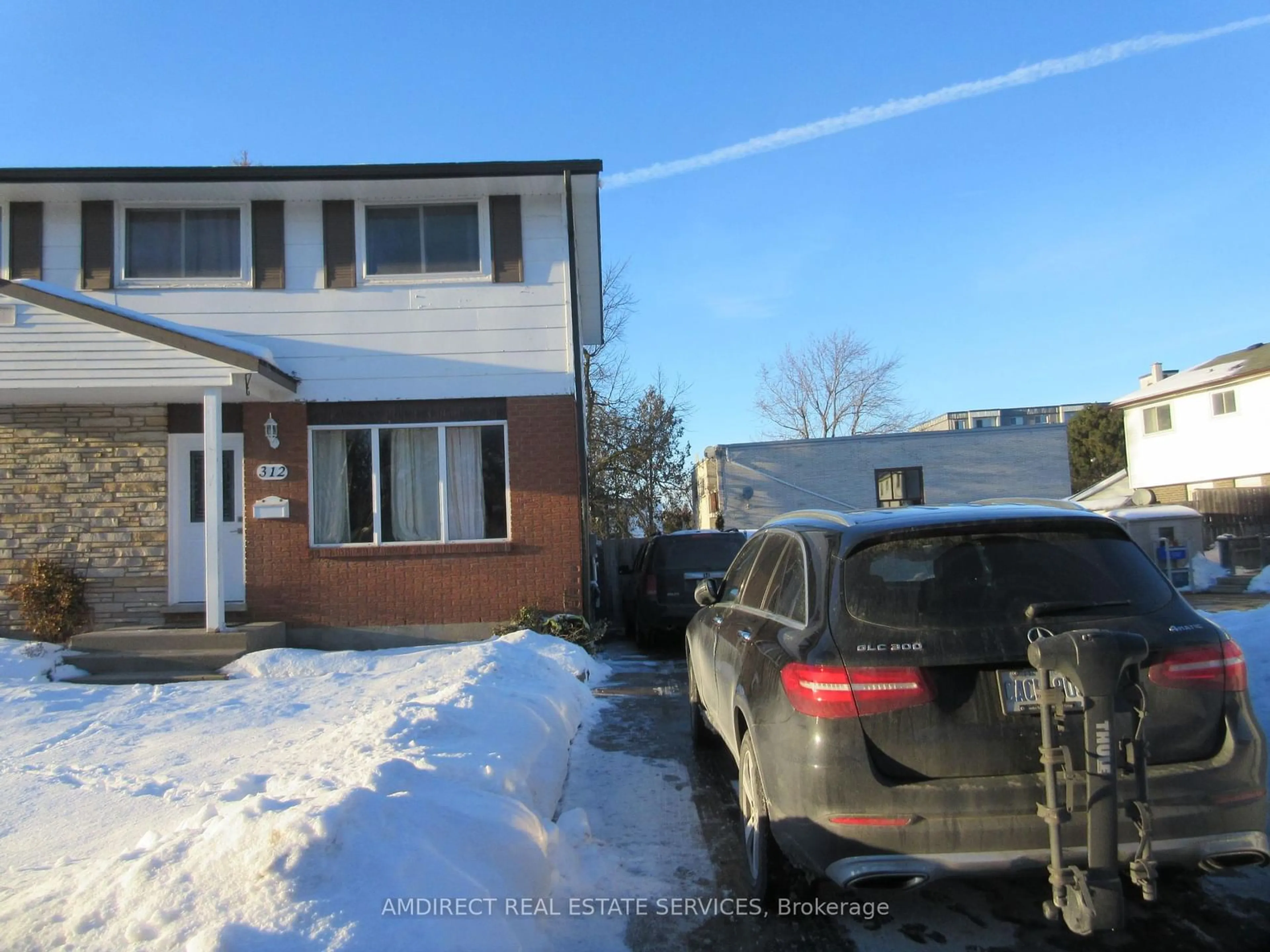 A pic from outside/outdoor area/front of a property/back of a property/a pic from drone, street for 312 Karn St, Kitchener Ontario N2M 2C1