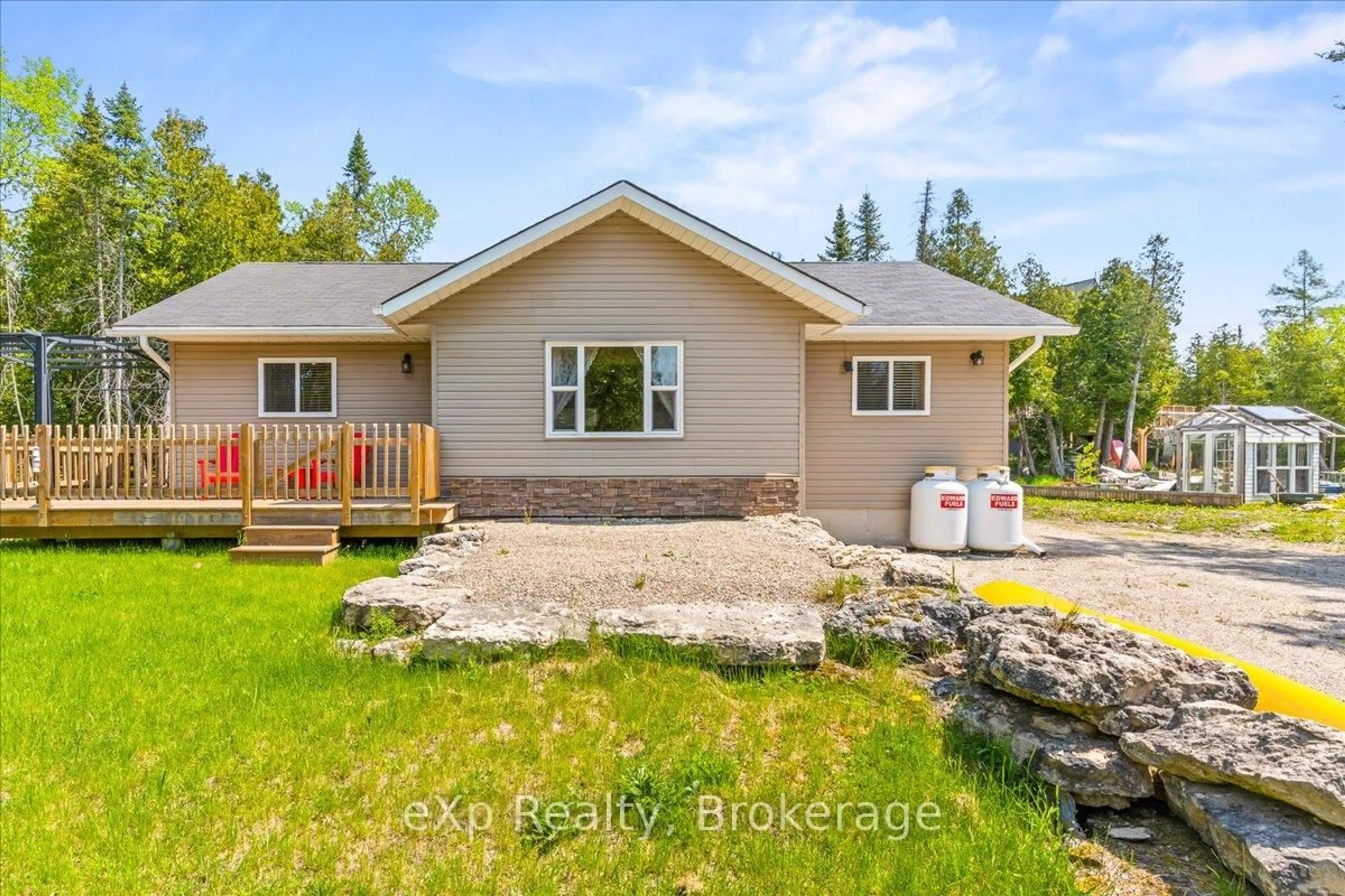 A pic from outside/outdoor area/front of a property/back of a property/a pic from drone, water/lake/river/ocean view for 19 Murray Ave, Northern Bruce Peninsula Ontario N0H 1W0