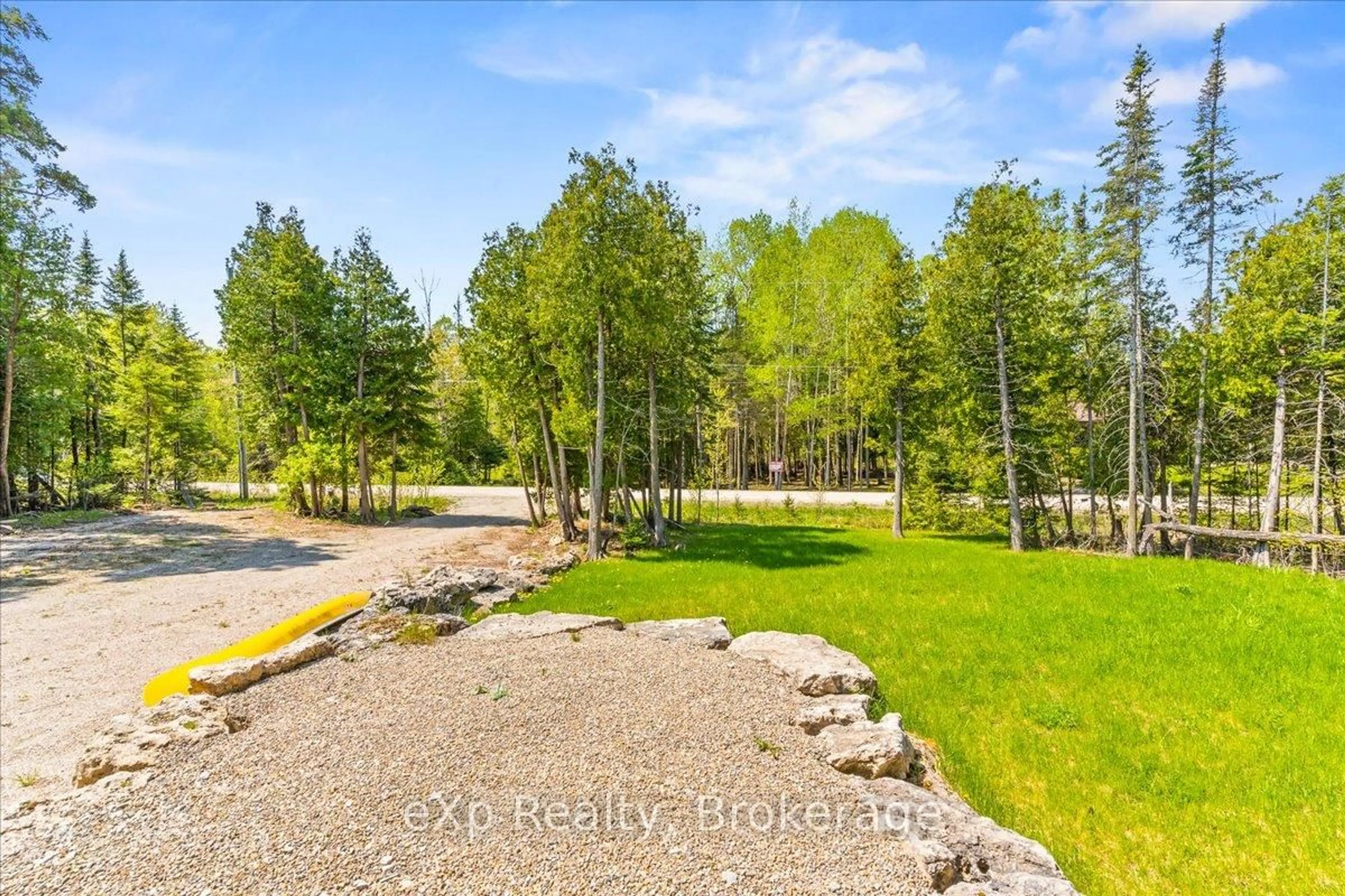 A pic from outside/outdoor area/front of a property/back of a property/a pic from drone, forest/trees view for 19 Murray Ave, Northern Bruce Peninsula Ontario N0H 1W0