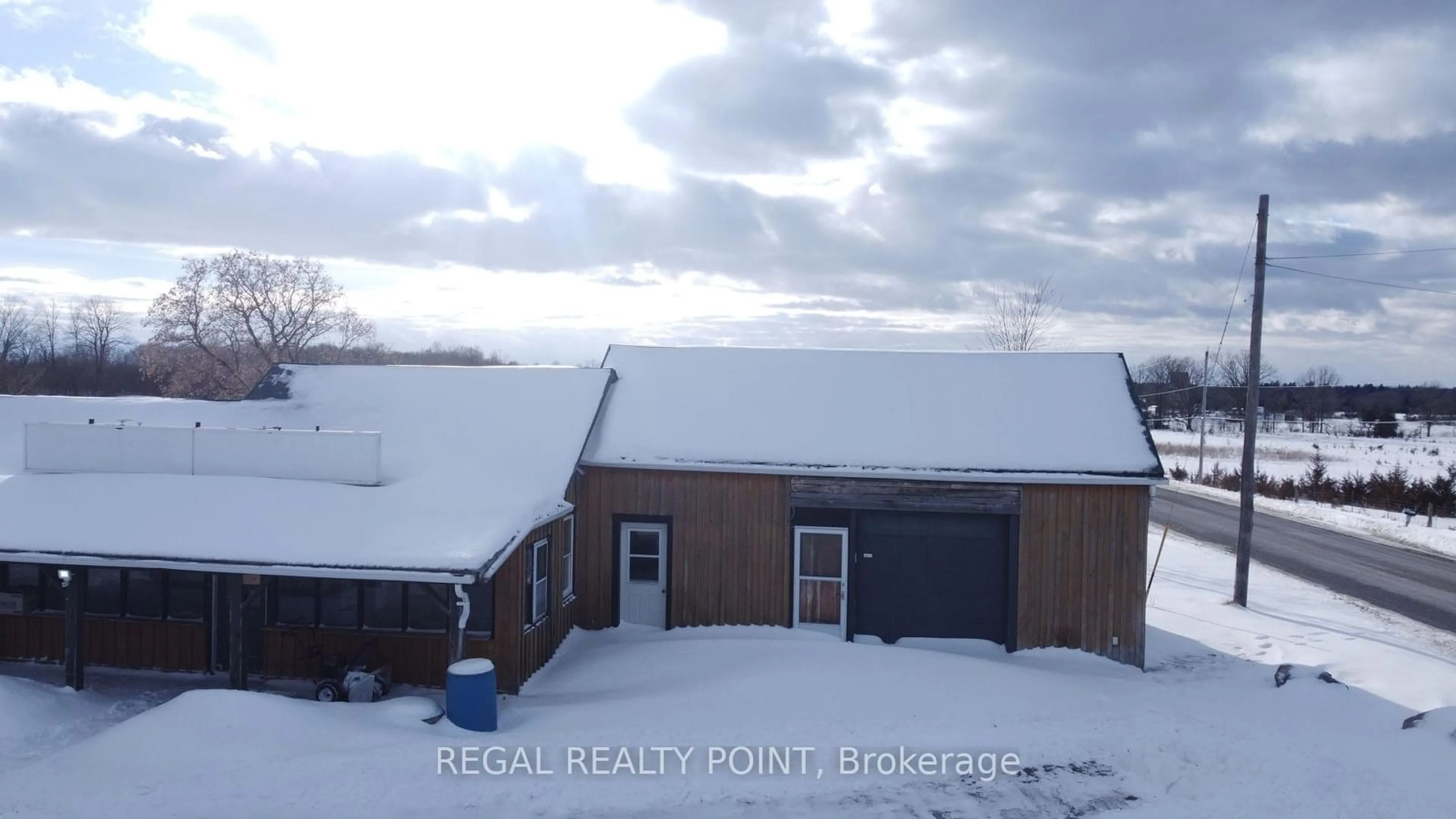 A pic from outside/outdoor area/front of a property/back of a property/a pic from drone, street for 2220 COUNTY ROAD 41, Greater Napanee Ontario K7R 3L2