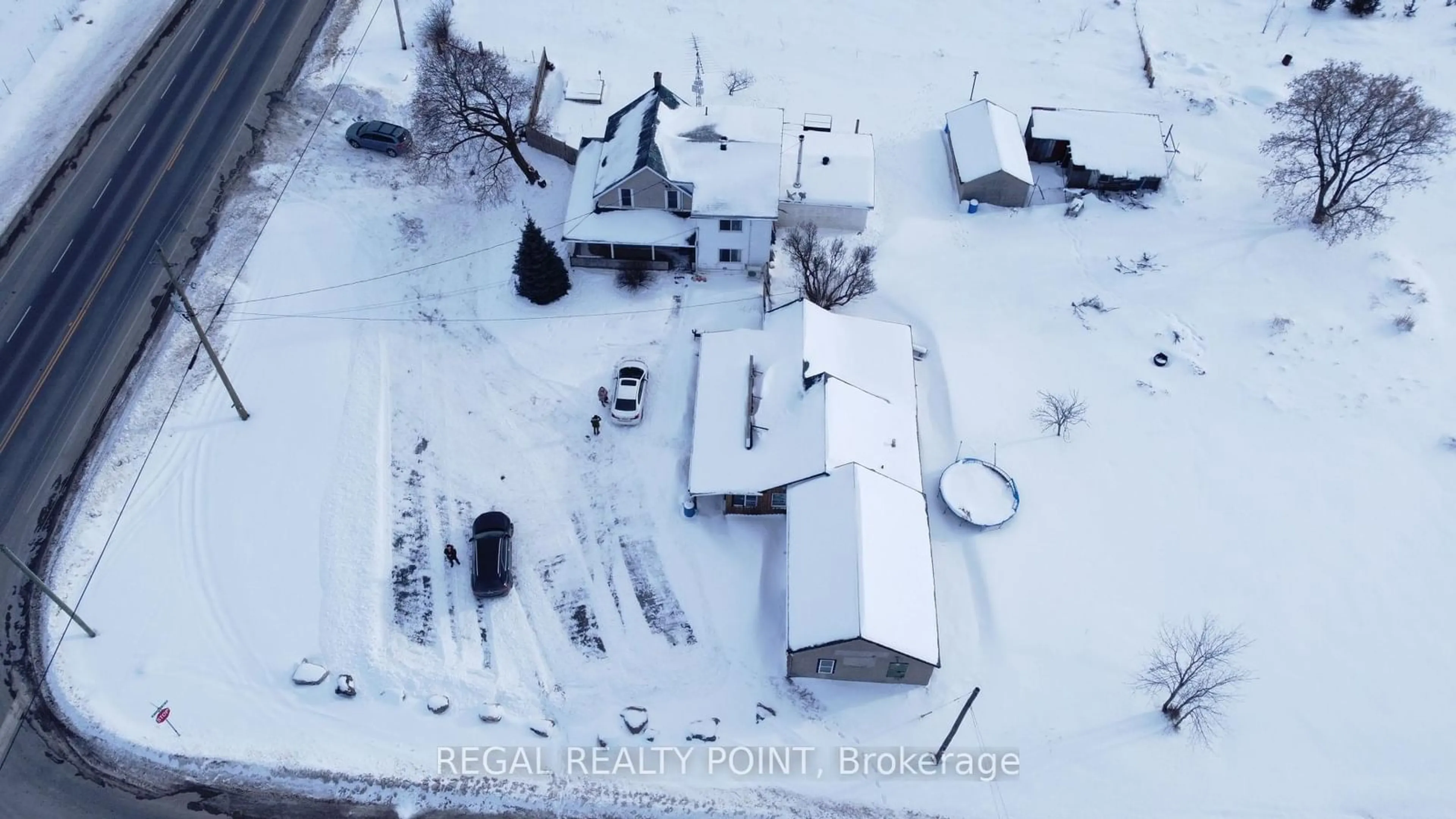 A pic from outside/outdoor area/front of a property/back of a property/a pic from drone, street for 2220 COUNTY ROAD 41, Greater Napanee Ontario K7R 3L2