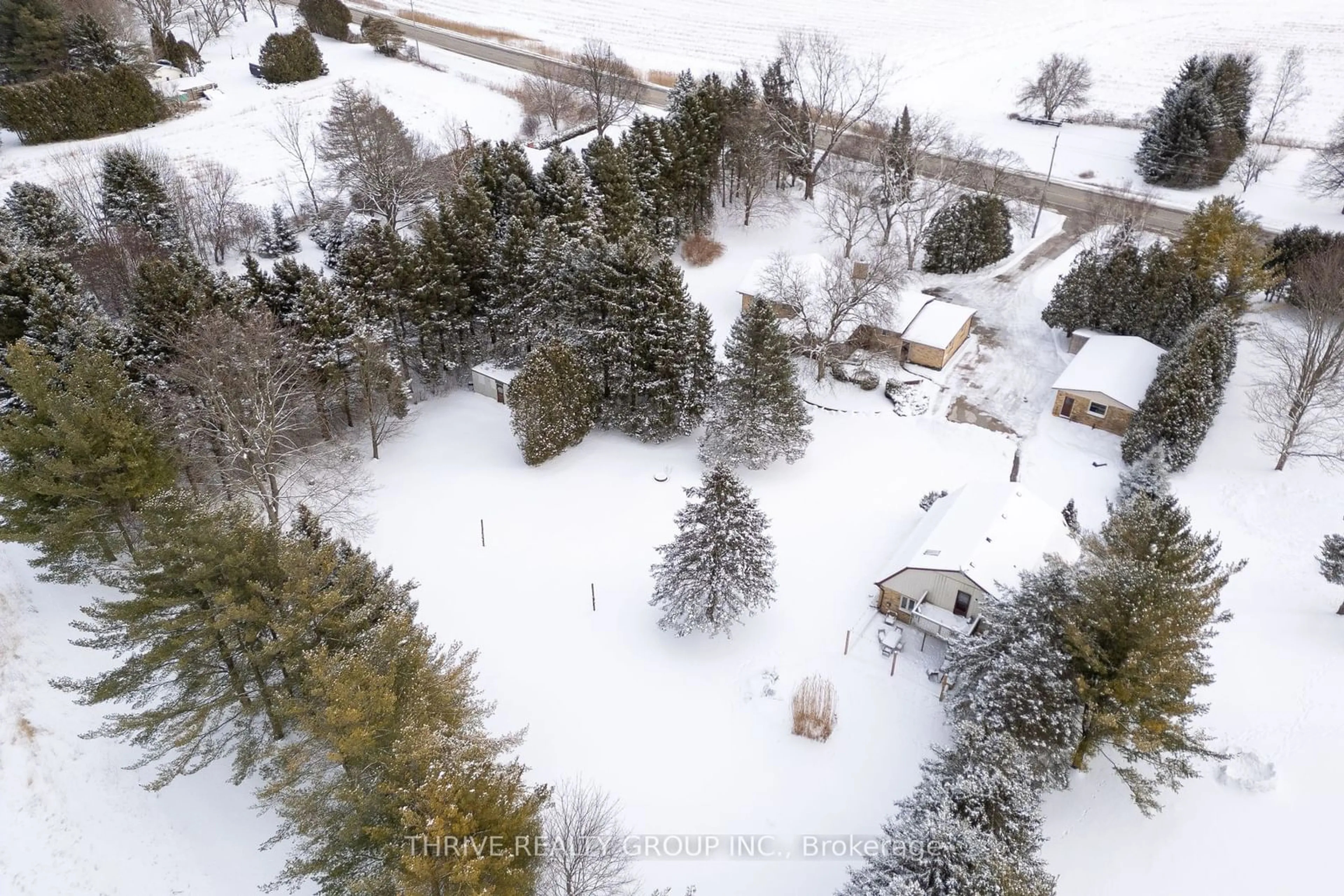 A pic from outside/outdoor area/front of a property/back of a property/a pic from drone, unknown for 9736 Longwoods Rd, Middlesex Centre Ontario N6P 1P2