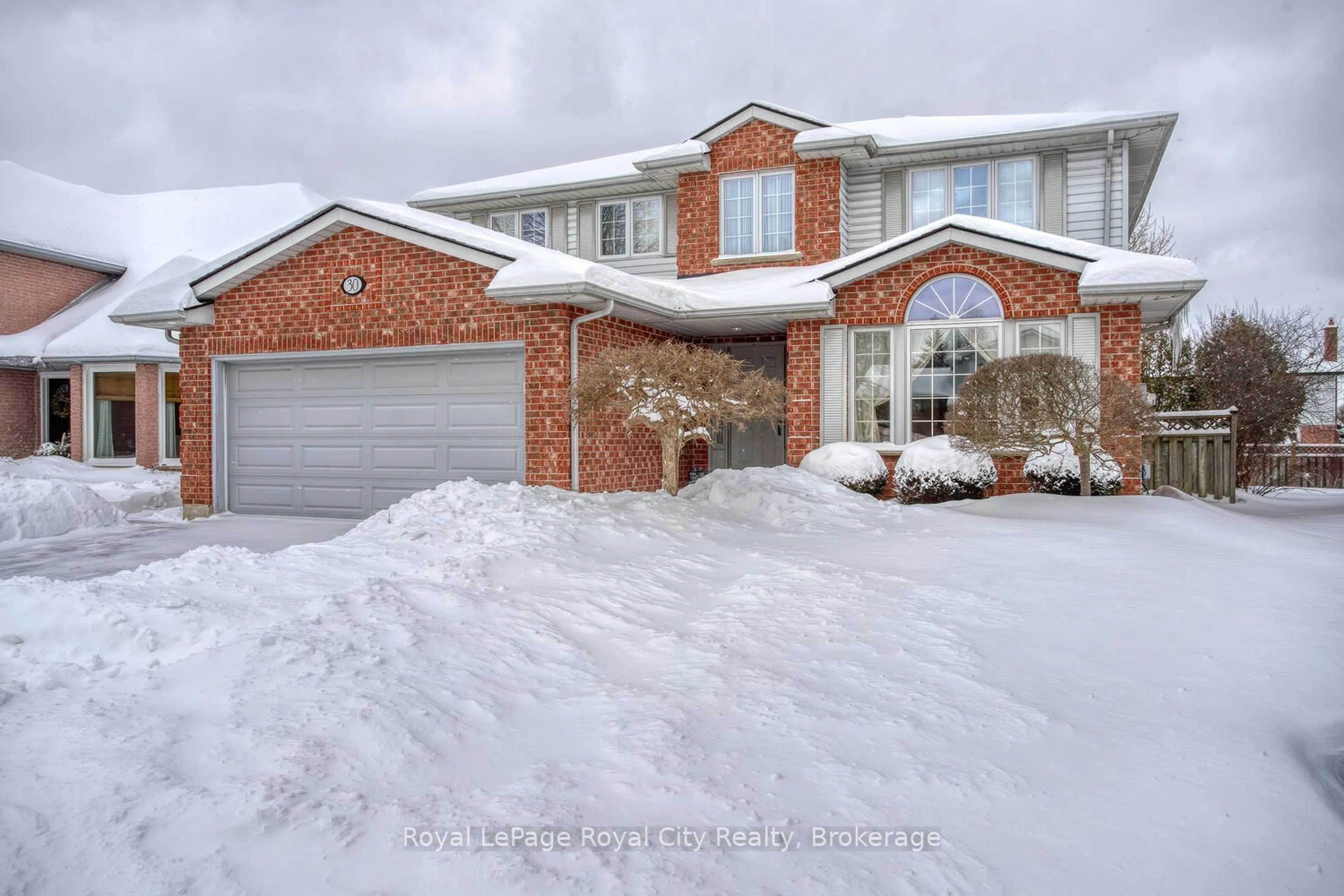 Home with brick exterior material, street for 30 Cherrywood Dr, Guelph Ontario N1K 1R7