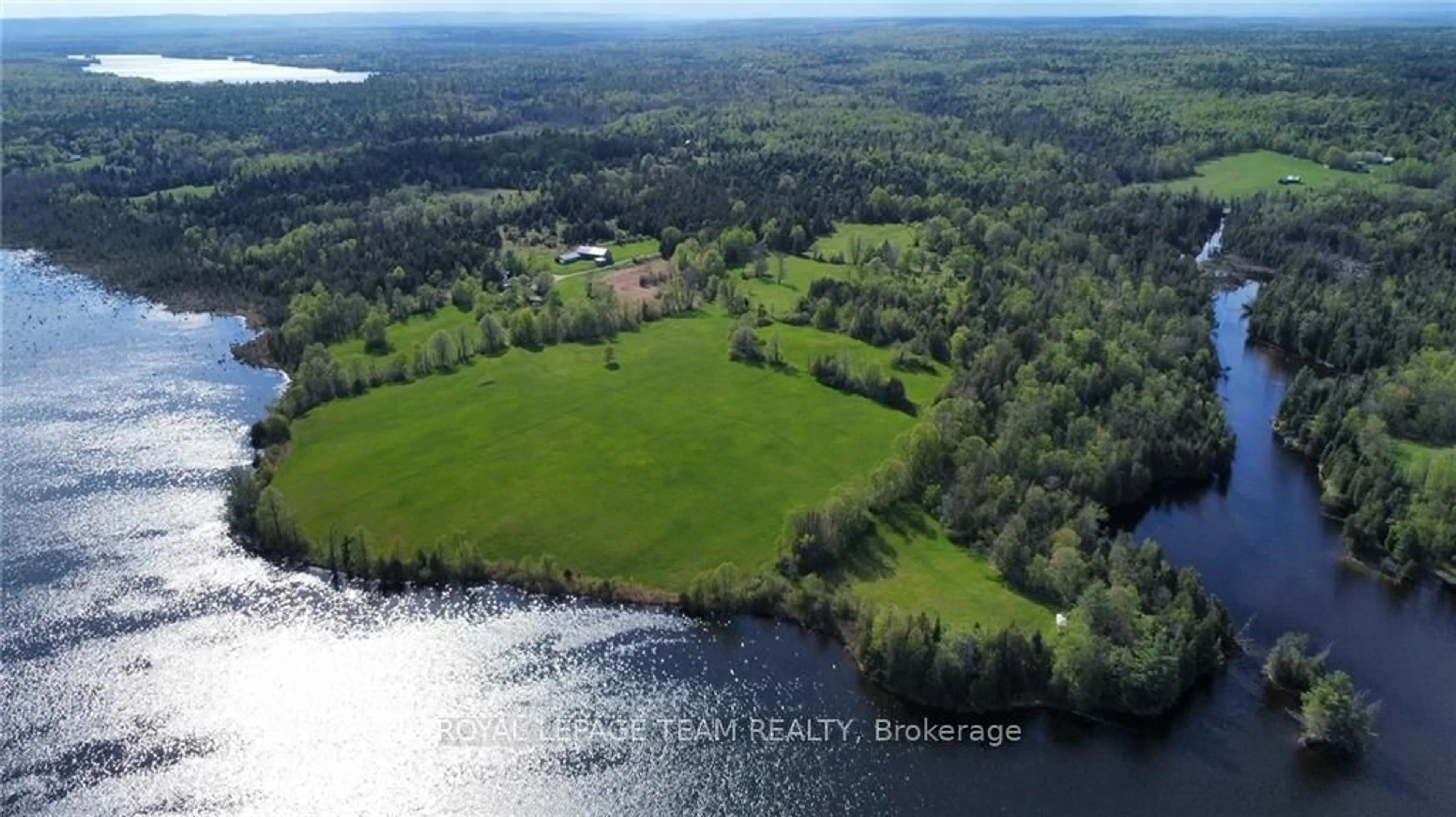 A pic from outside/outdoor area/front of a property/back of a property/a pic from drone, water/lake/river/ocean view for 105 Halliday Creek Rd, Greater Madawaska Ontario K0J 1G0