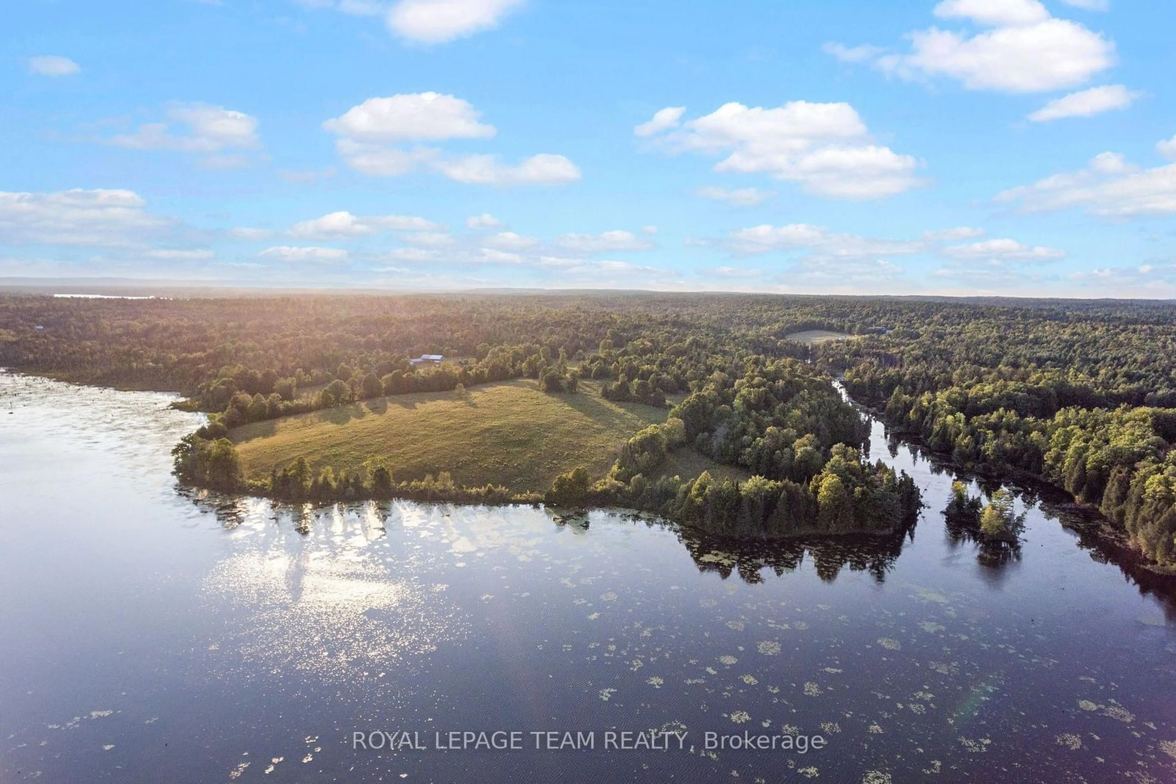 A pic from outside/outdoor area/front of a property/back of a property/a pic from drone, water/lake/river/ocean view for 105 Halliday Creek Rd, Greater Madawaska Ontario K0J 1G0